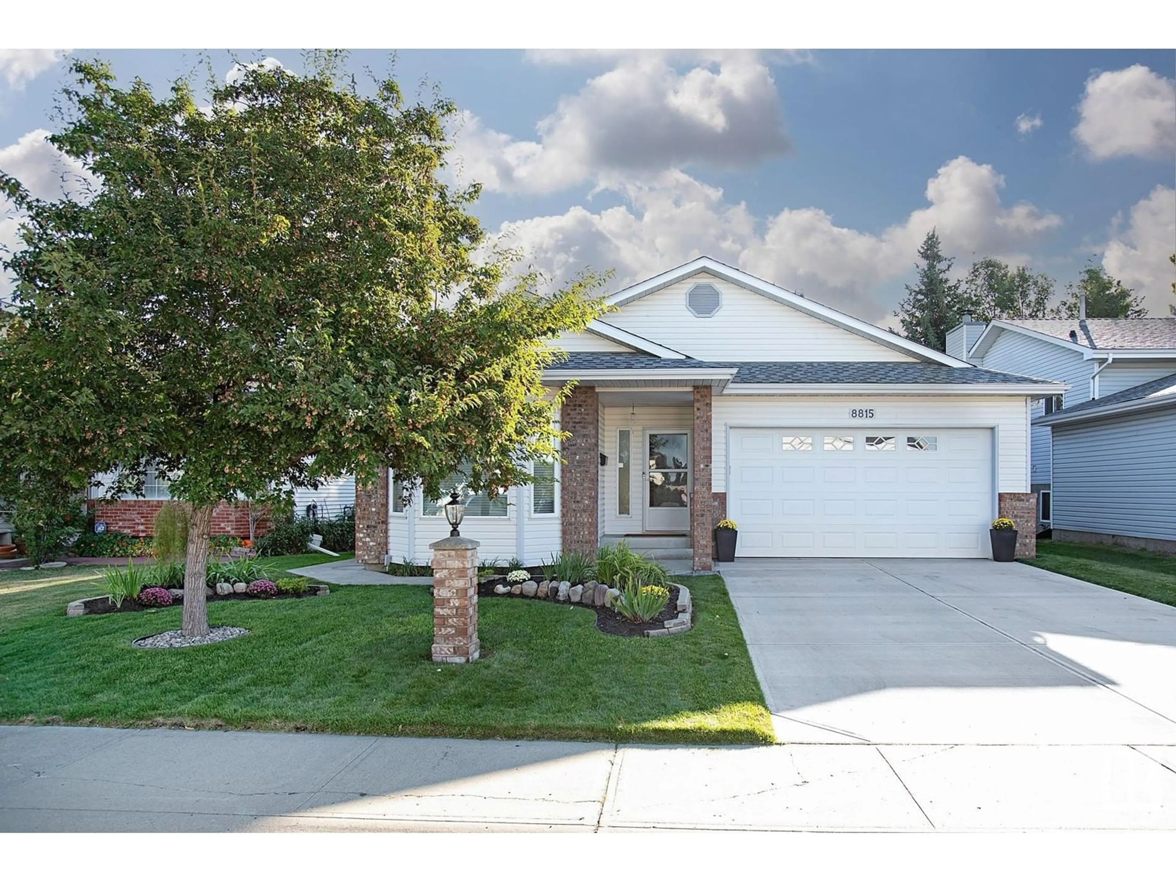 Home with vinyl exterior material, street for 8815 188 STREET, Edmonton Alberta T5T5Z8