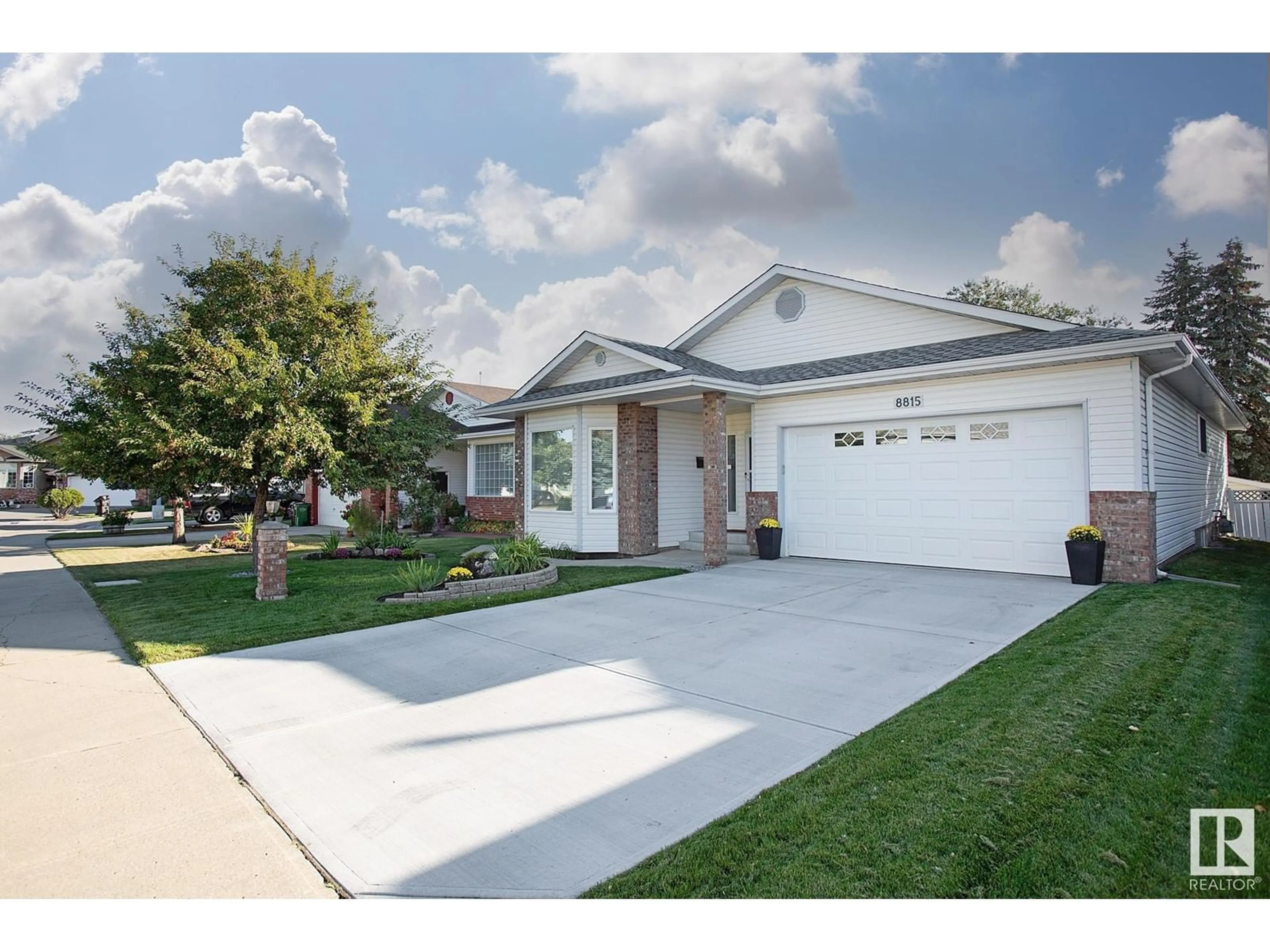 Home with vinyl exterior material, street for 8815 188 STREET, Edmonton Alberta T5T5Z8