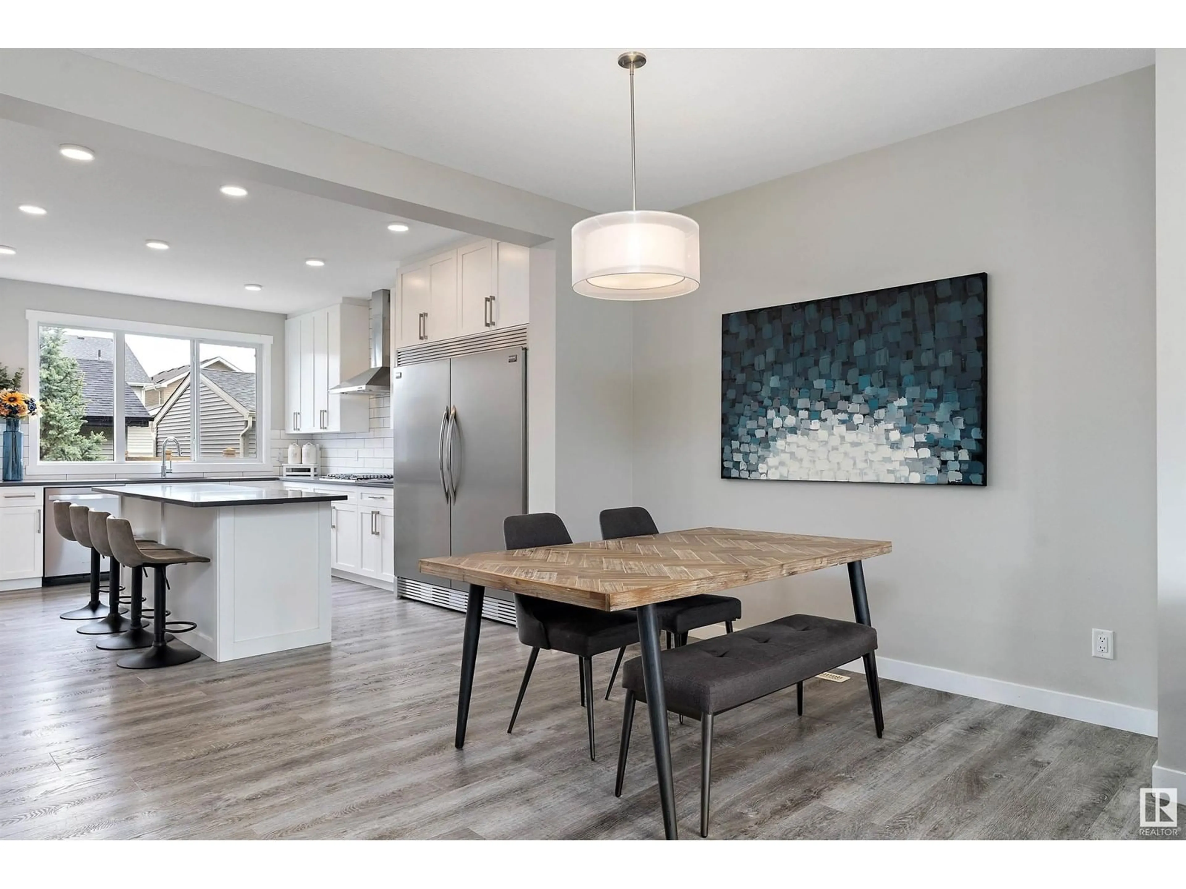 Open concept kitchen, wood/laminate floor for SW - 2111 160 ST, Edmonton Alberta T6W4E5
