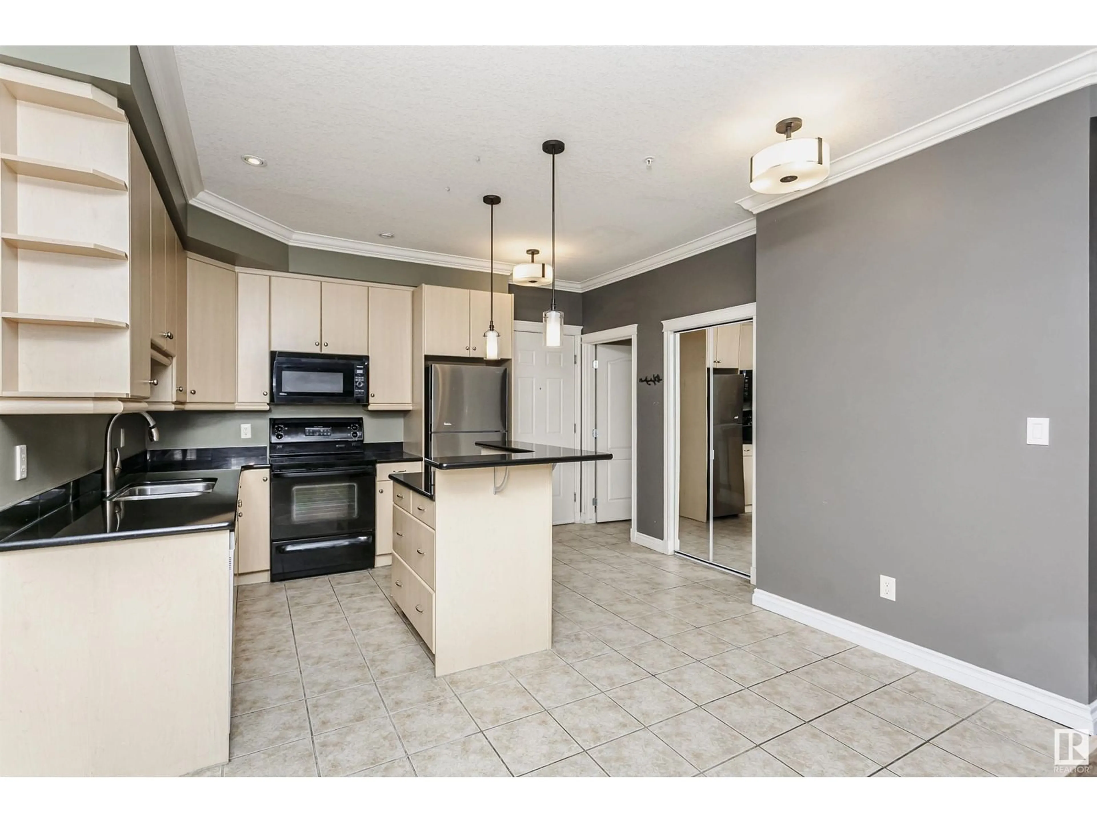 Open concept kitchen, ceramic/tile floor for 310 - 10116 80 AV, Edmonton Alberta T6E6V7