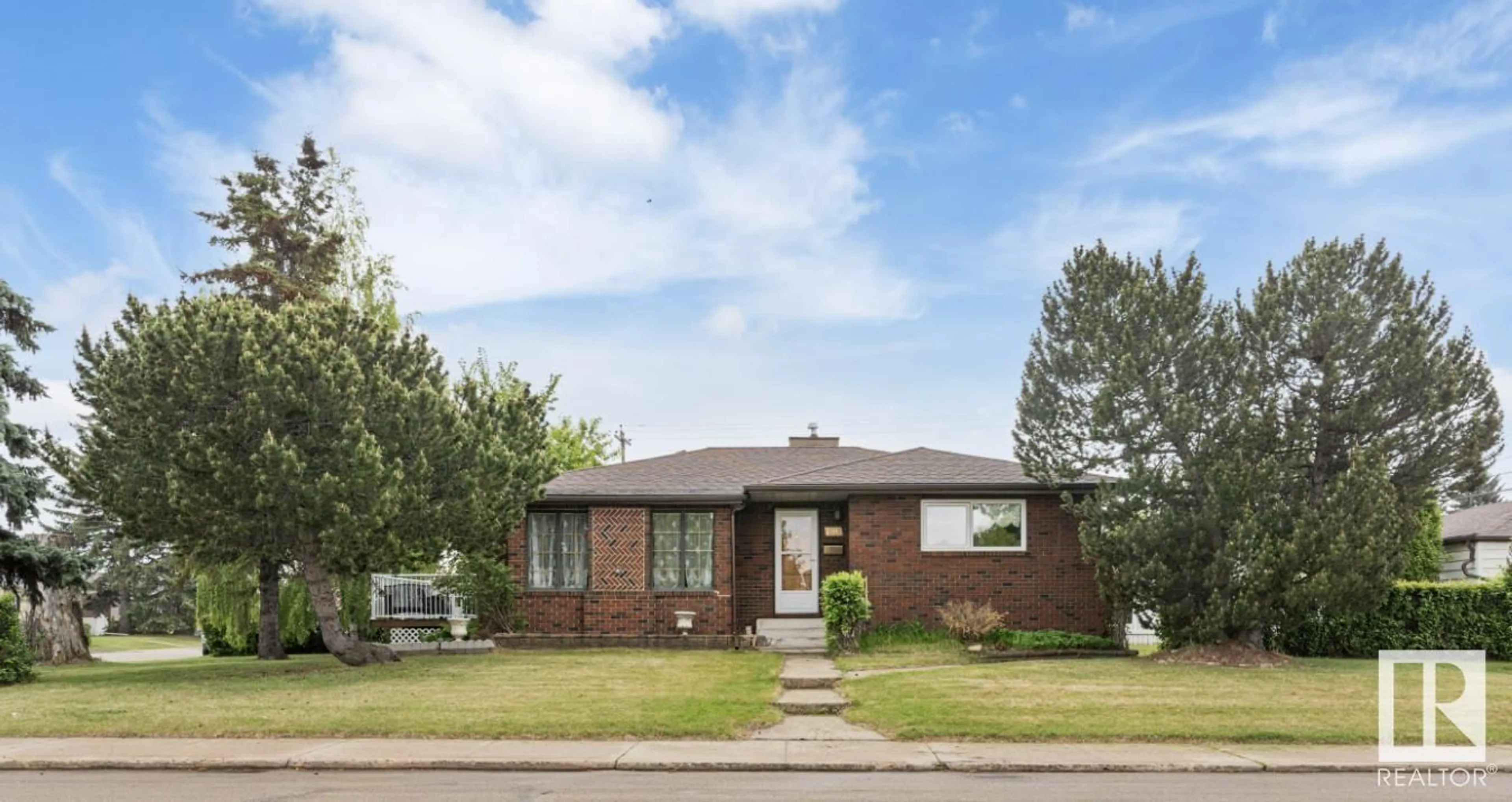 Home with brick exterior material, street for 7803 130 AVENUE AVENUE, Edmonton Alberta T5C1Y4