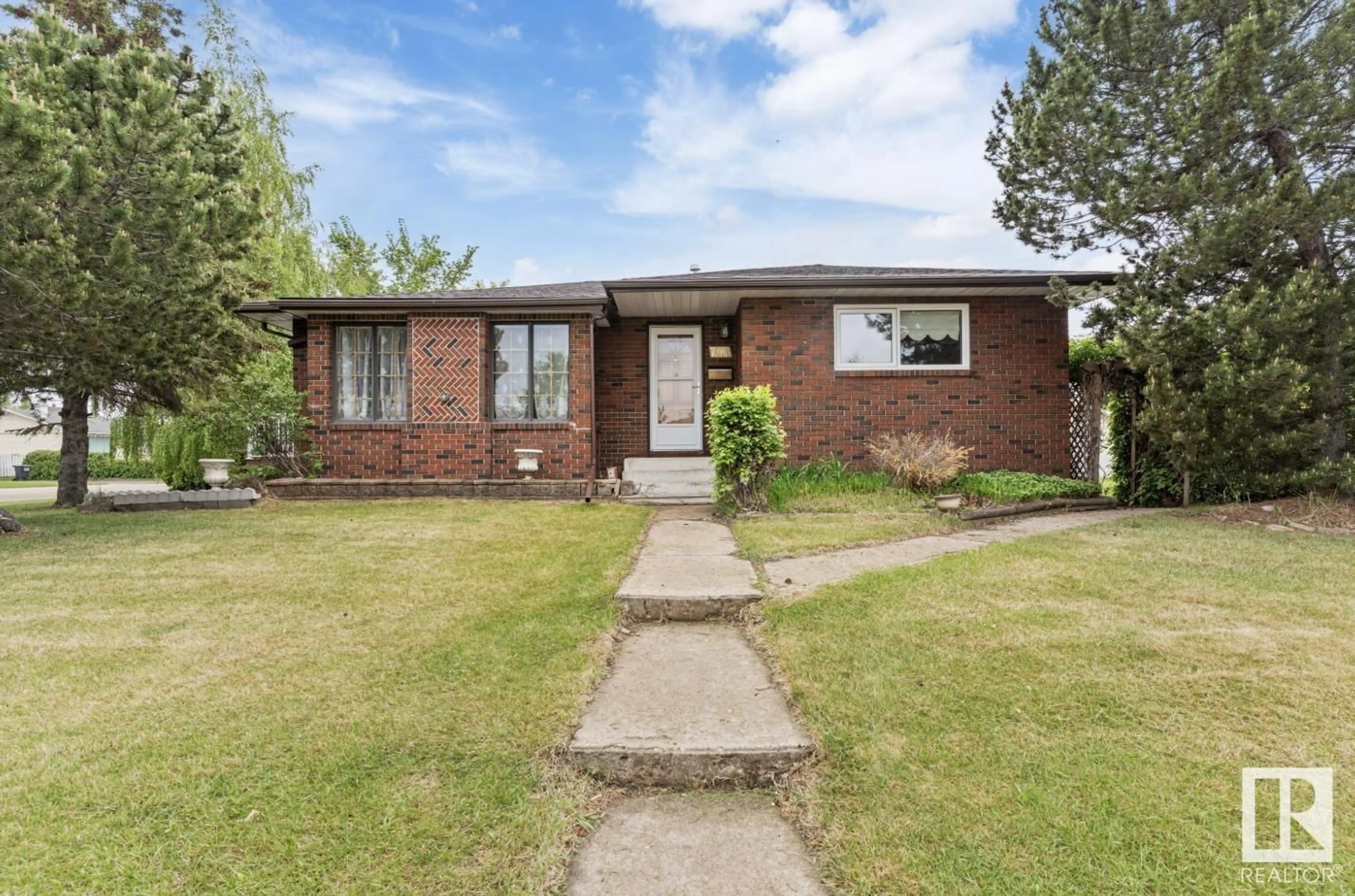 Home with brick exterior material, street for 7803 130 AVENUE AVENUE, Edmonton Alberta T5C1Y4