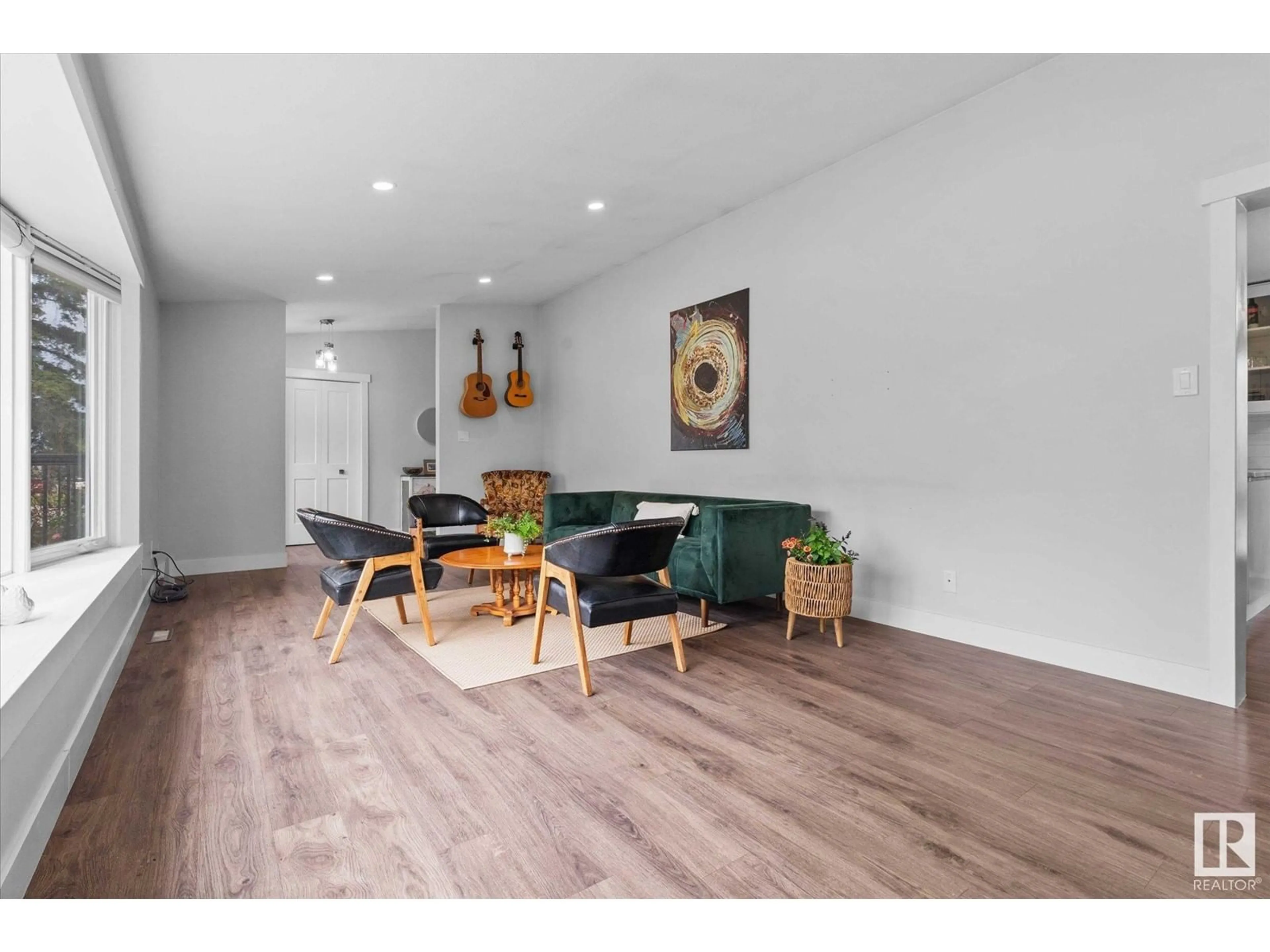 Living room with furniture, wood/laminate floor for 4920 47 AV, Evansburg Alberta T0E0T0