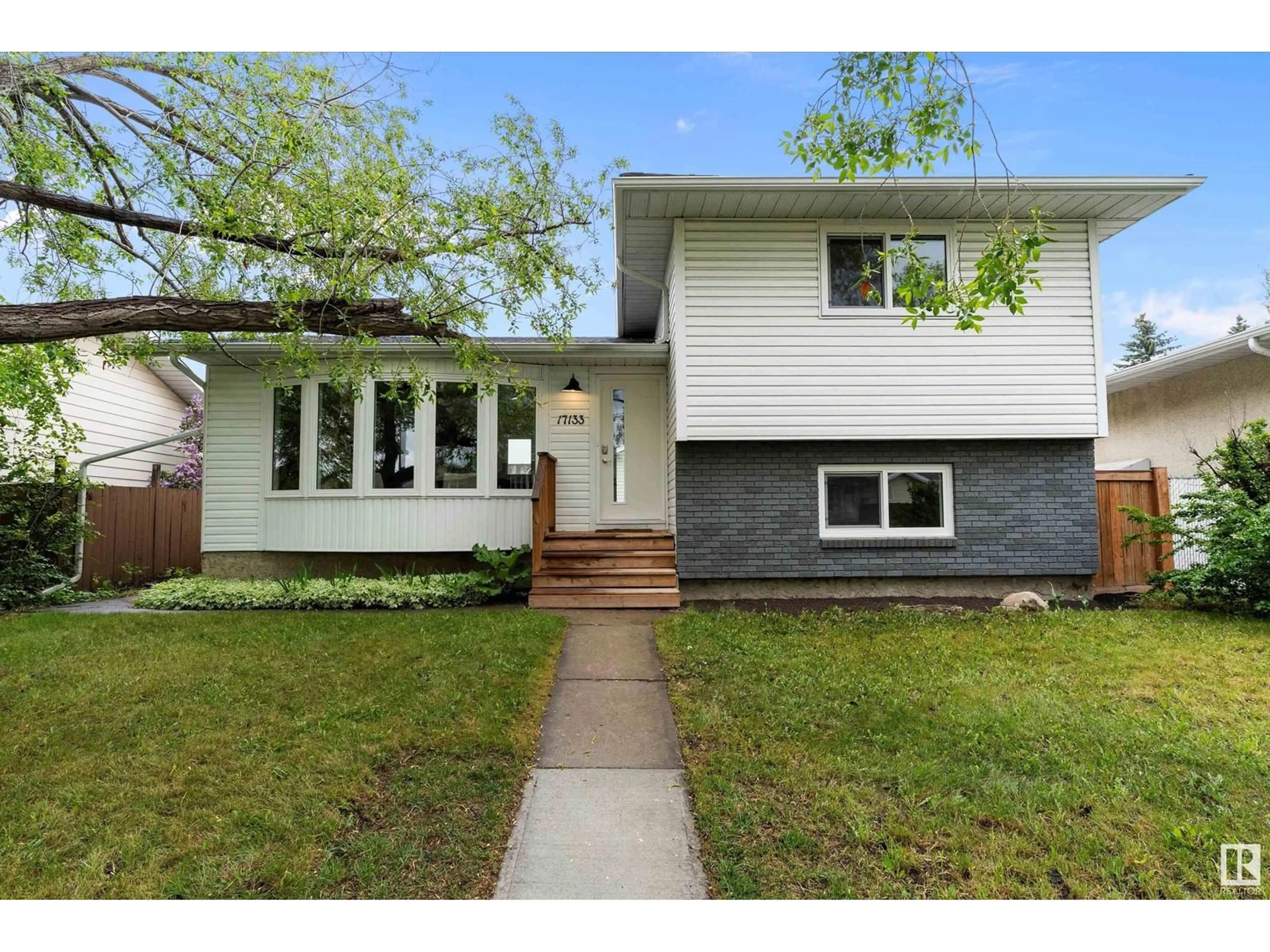 Home with vinyl exterior material, street for 17133 100 ST, Edmonton Alberta T5X3R6