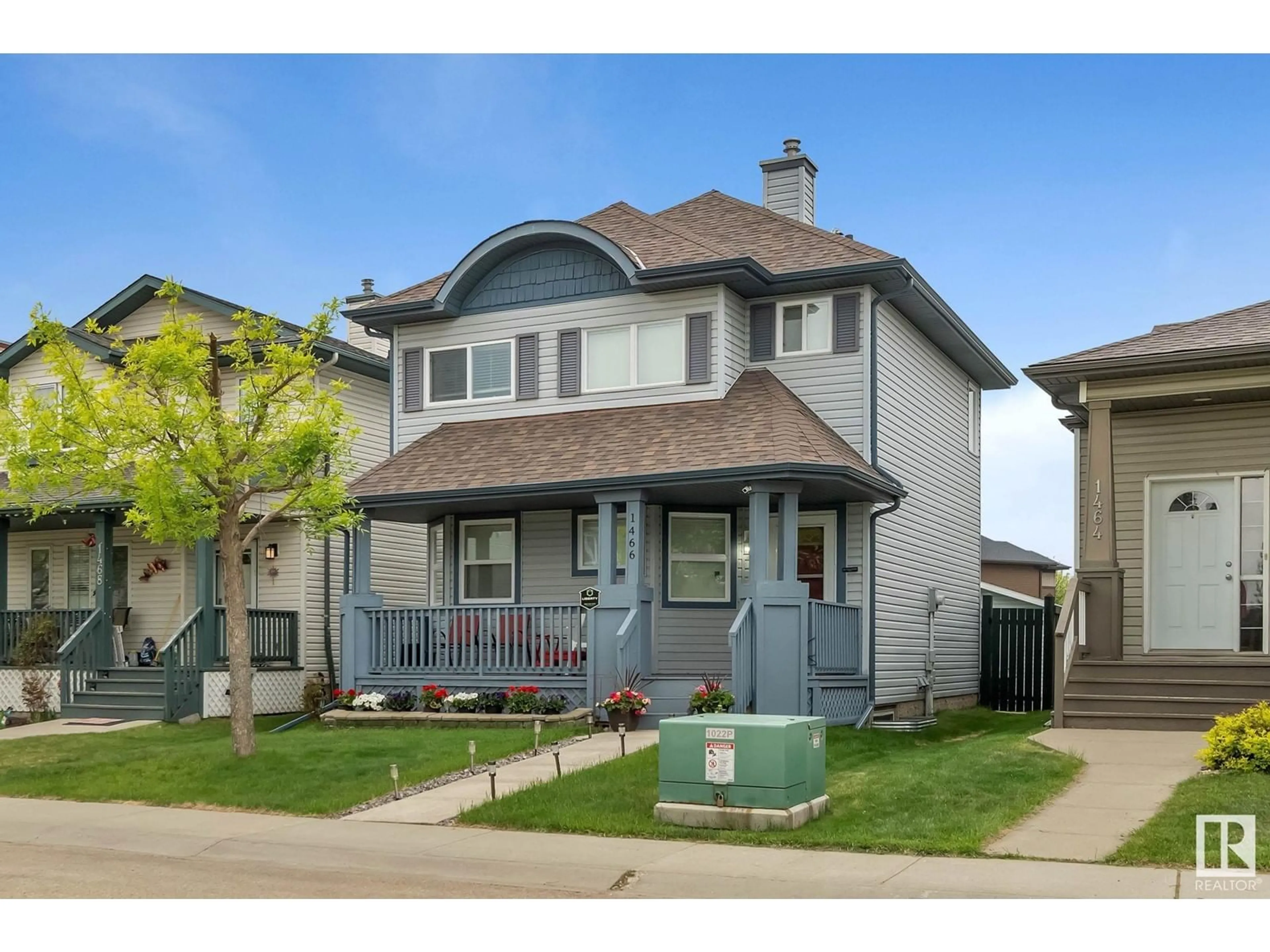 Home with vinyl exterior material, street for 1466 GRANT WY, Edmonton Alberta T5T6L3