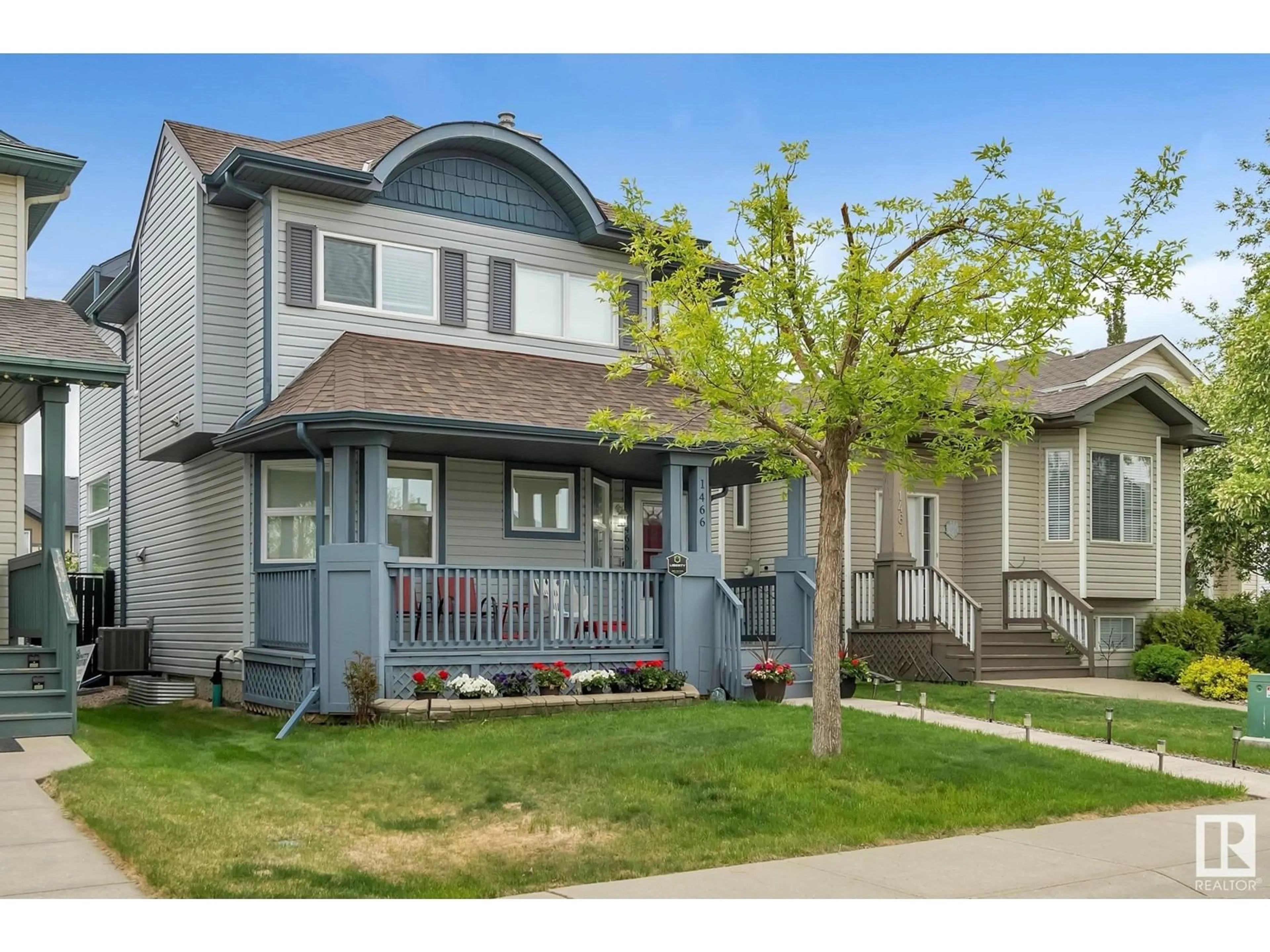 Home with vinyl exterior material, street for 1466 GRANT WY, Edmonton Alberta T5T6L3