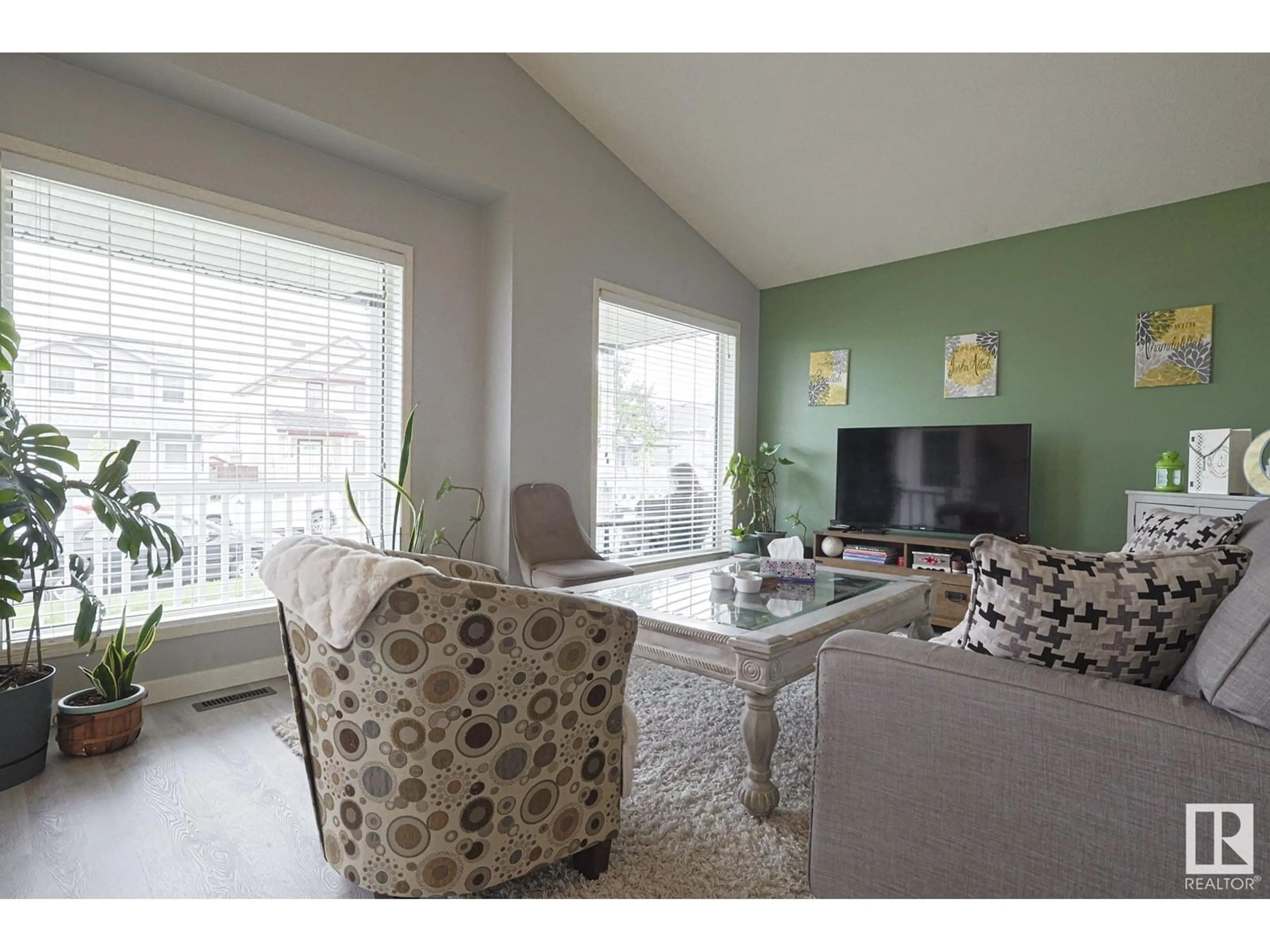 Living room with furniture, unknown for 3119 32 AV, Edmonton Alberta T6T1X3