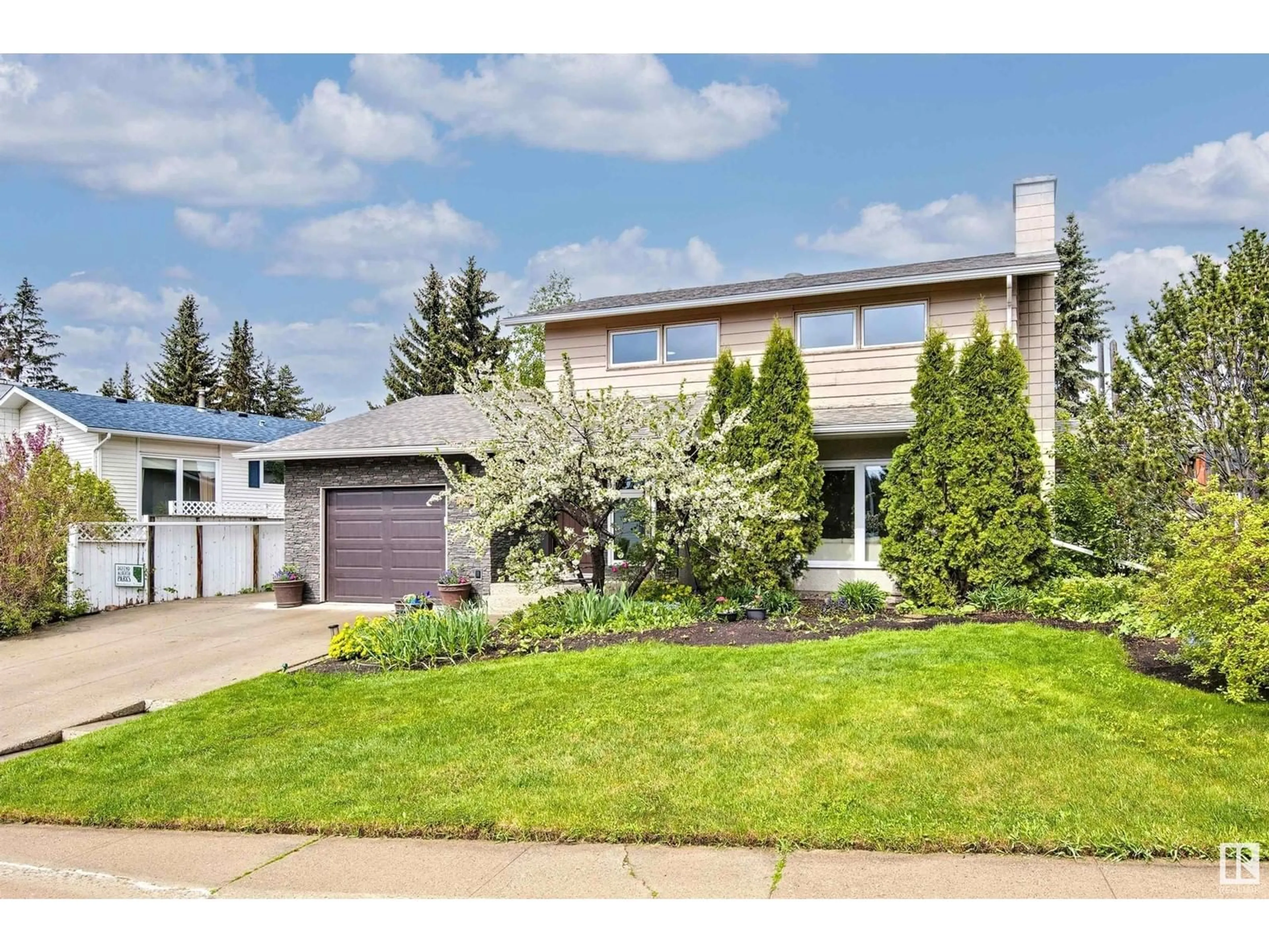 Home with vinyl exterior material, street for 4215 121 ST, Edmonton Alberta T6J1Y6