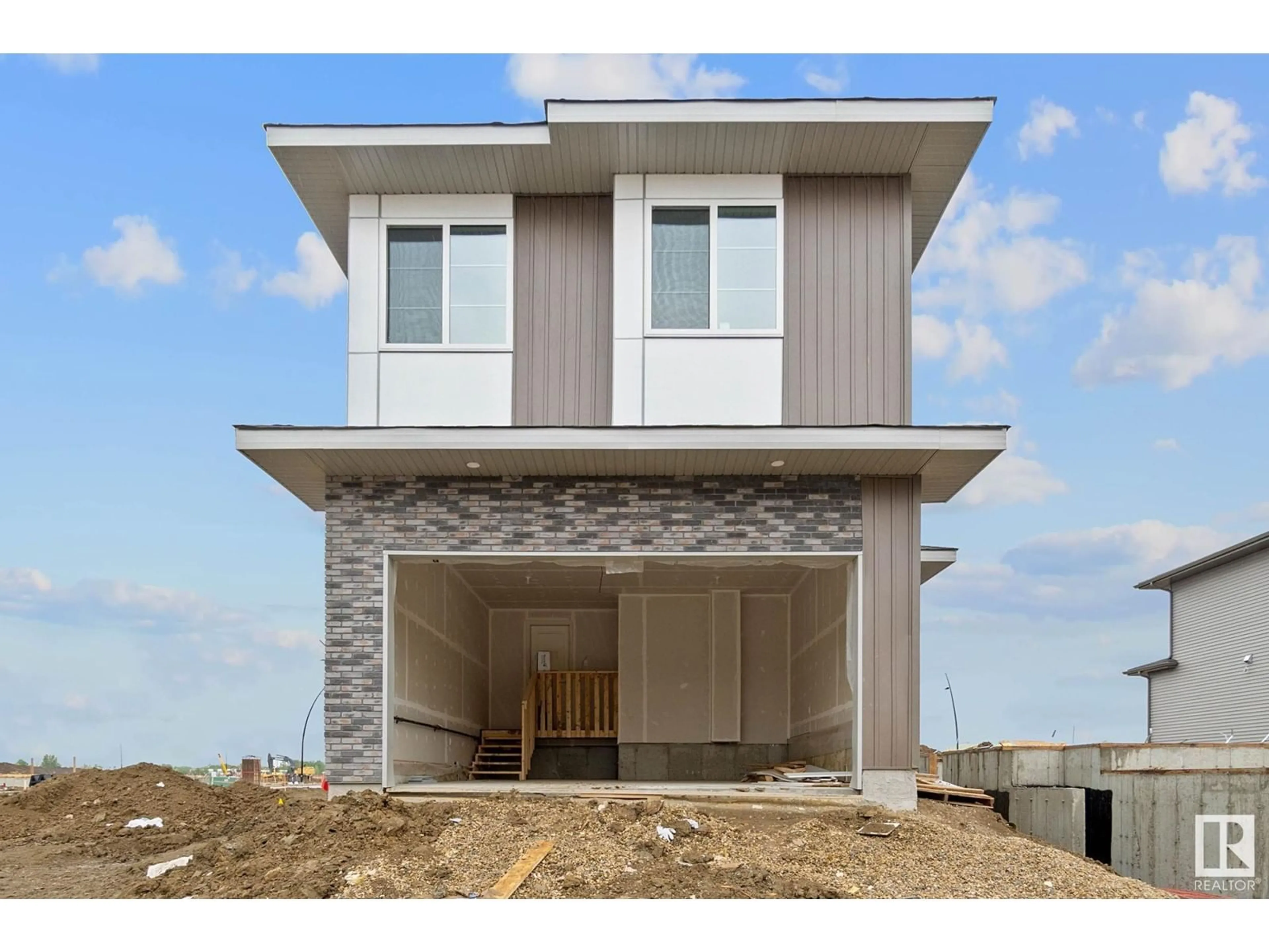 Home with vinyl exterior material, building for 2508 210 ST, Edmonton Alberta T6M1N9