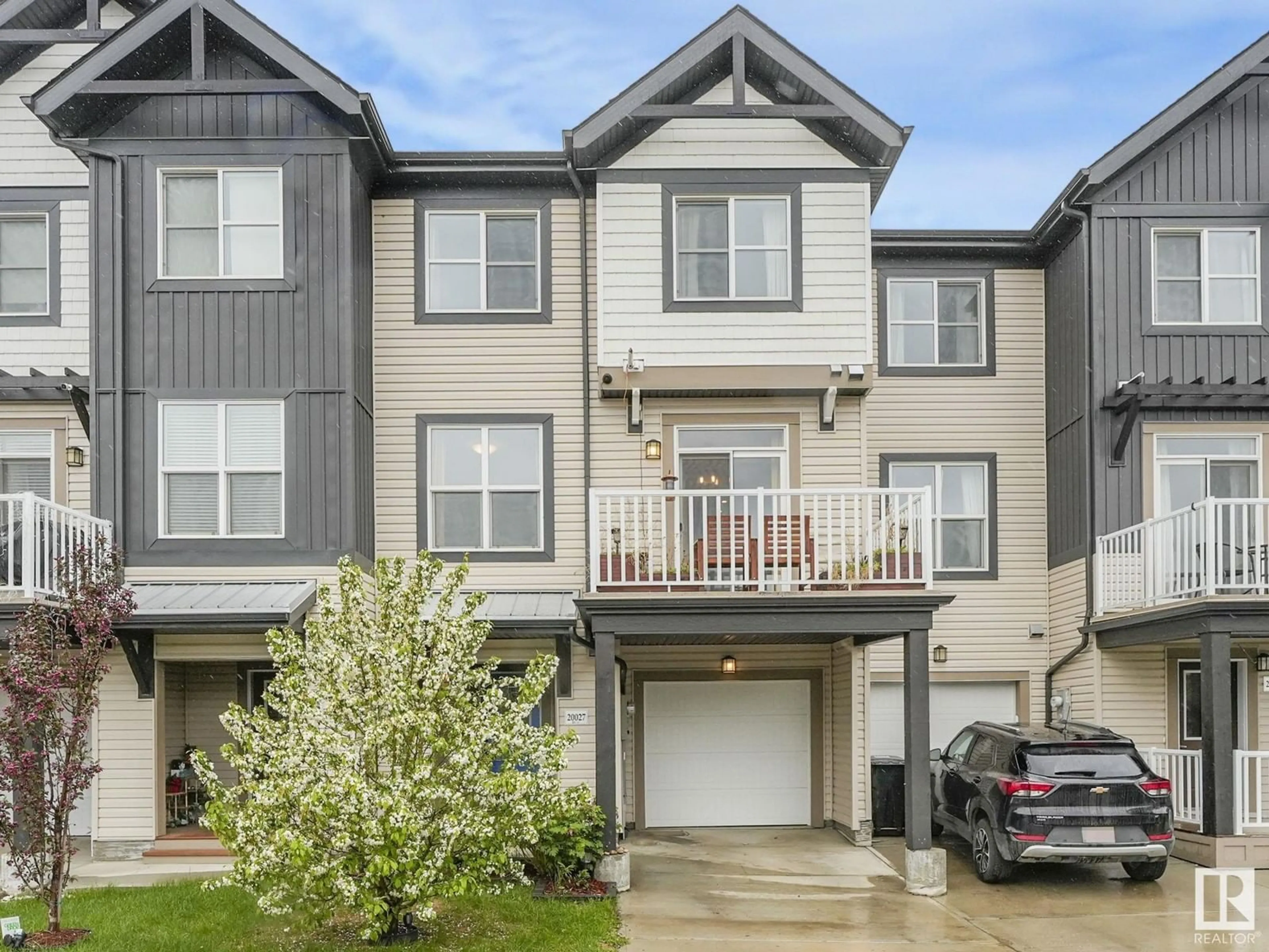Home with vinyl exterior material, street for NW - 20027 20 AV, Edmonton Alberta T6M0X7