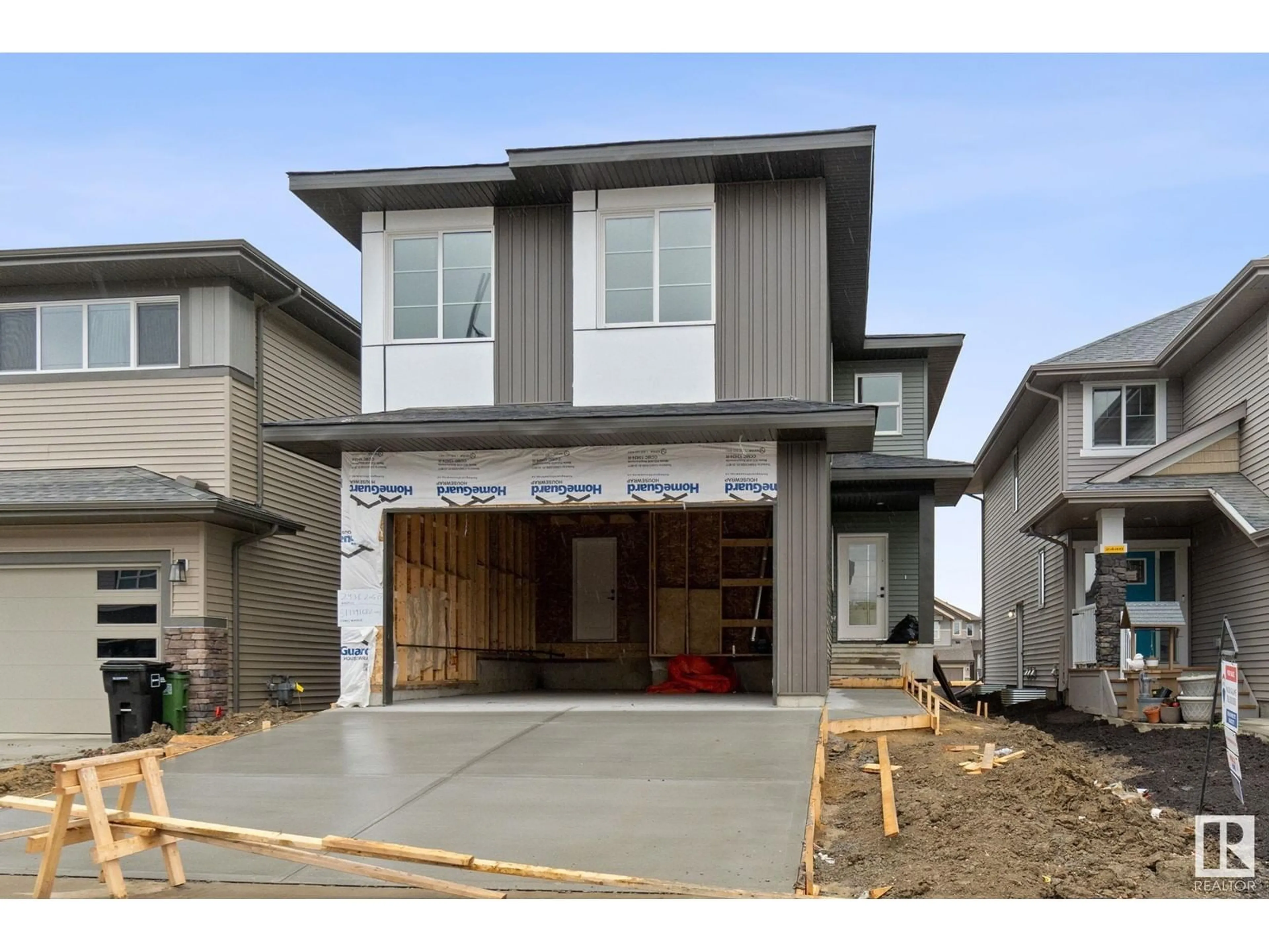 Home with vinyl exterior material, street for NW - 2436 205 ST, Edmonton Alberta T6M1N9