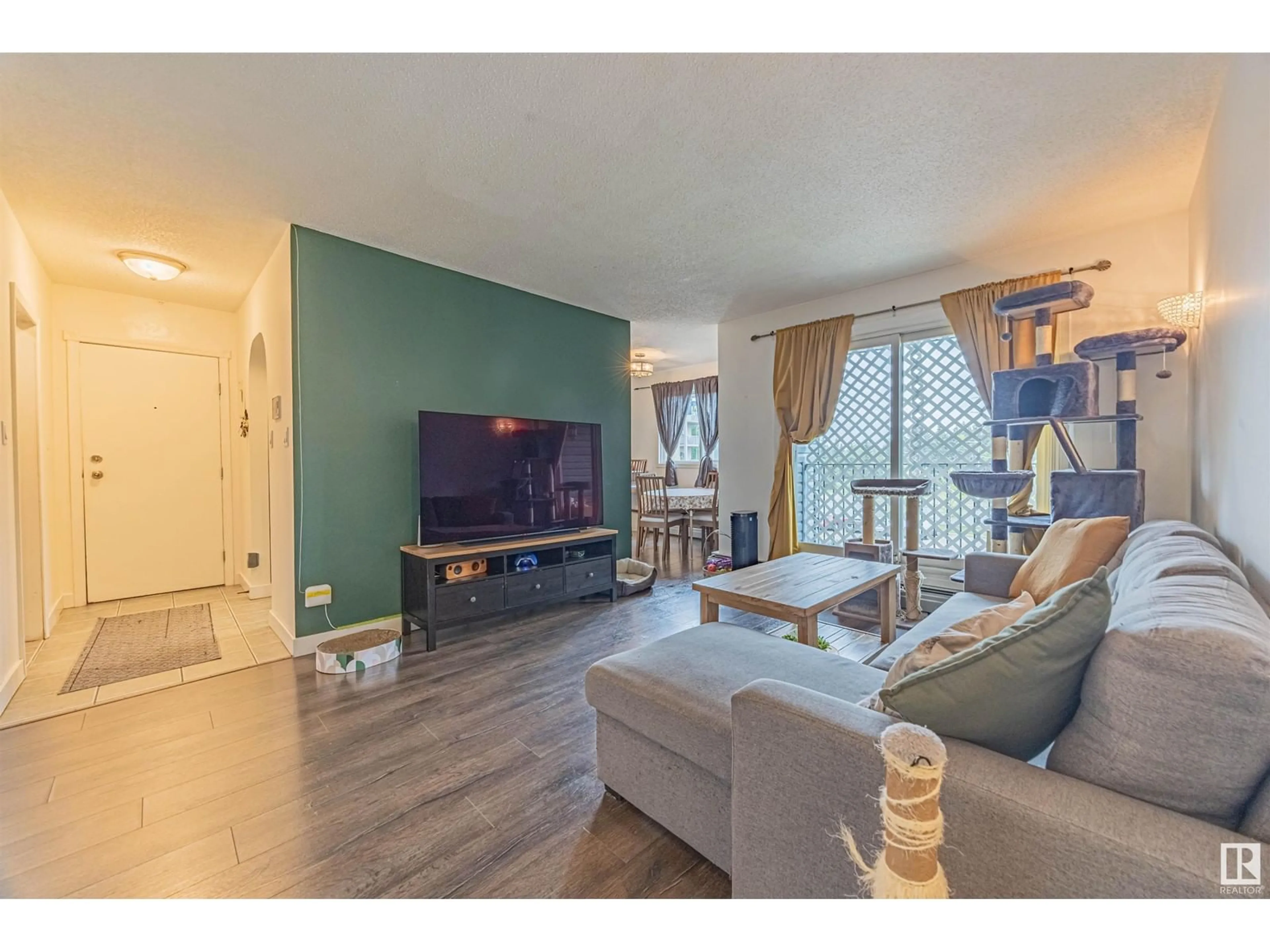 Living room with furniture, wood/laminate floor for #303 - 7407 171 ST, Edmonton Alberta T5T2R1