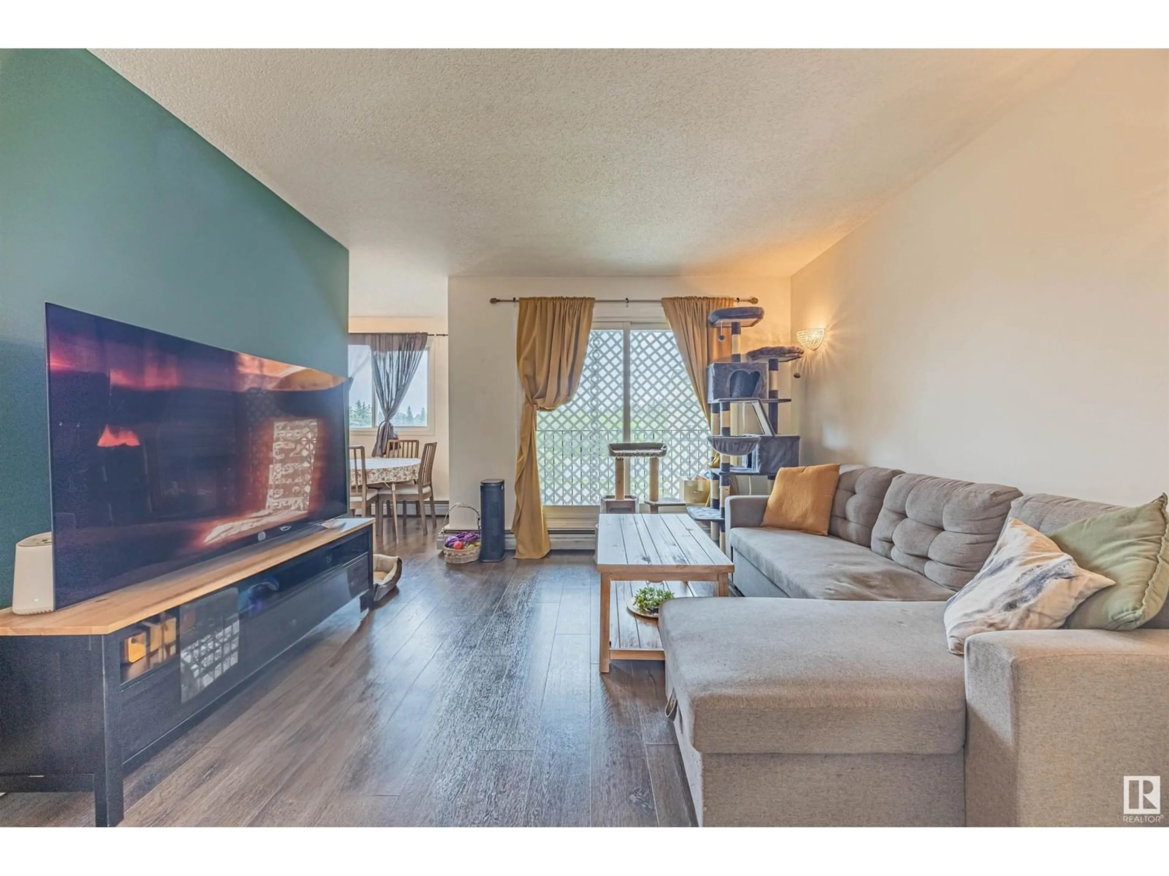 Living room with furniture, wood/laminate floor for #303 - 7407 171 ST, Edmonton Alberta T5T2R1