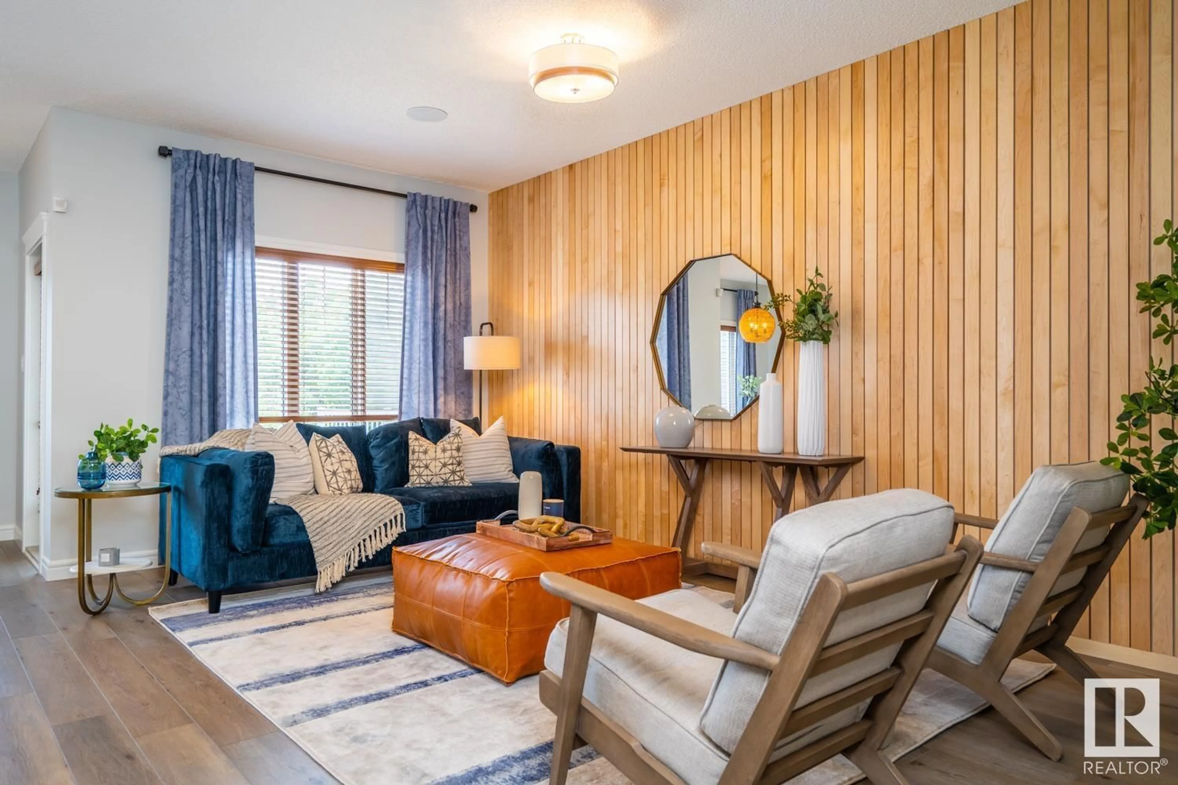 Living room with furniture, wood/laminate floor for 17623 46 ST, Edmonton Alberta T5Y4B7