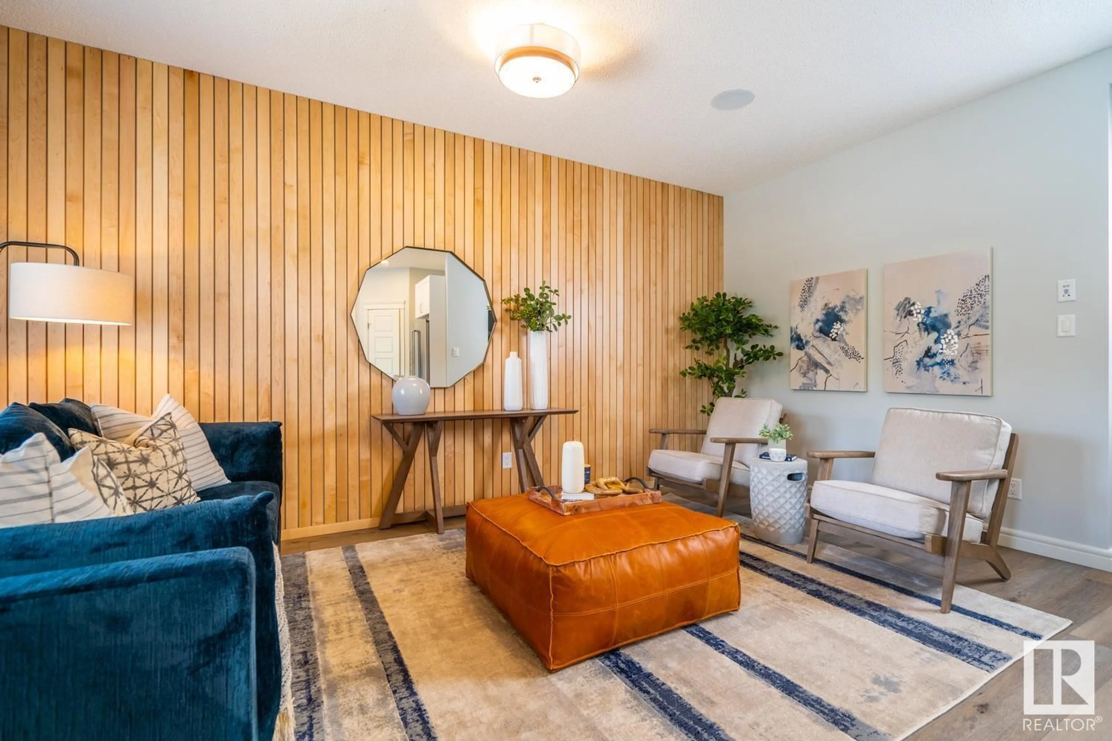 Living room with furniture, wood/laminate floor for 17623 46 ST, Edmonton Alberta T5Y4B7