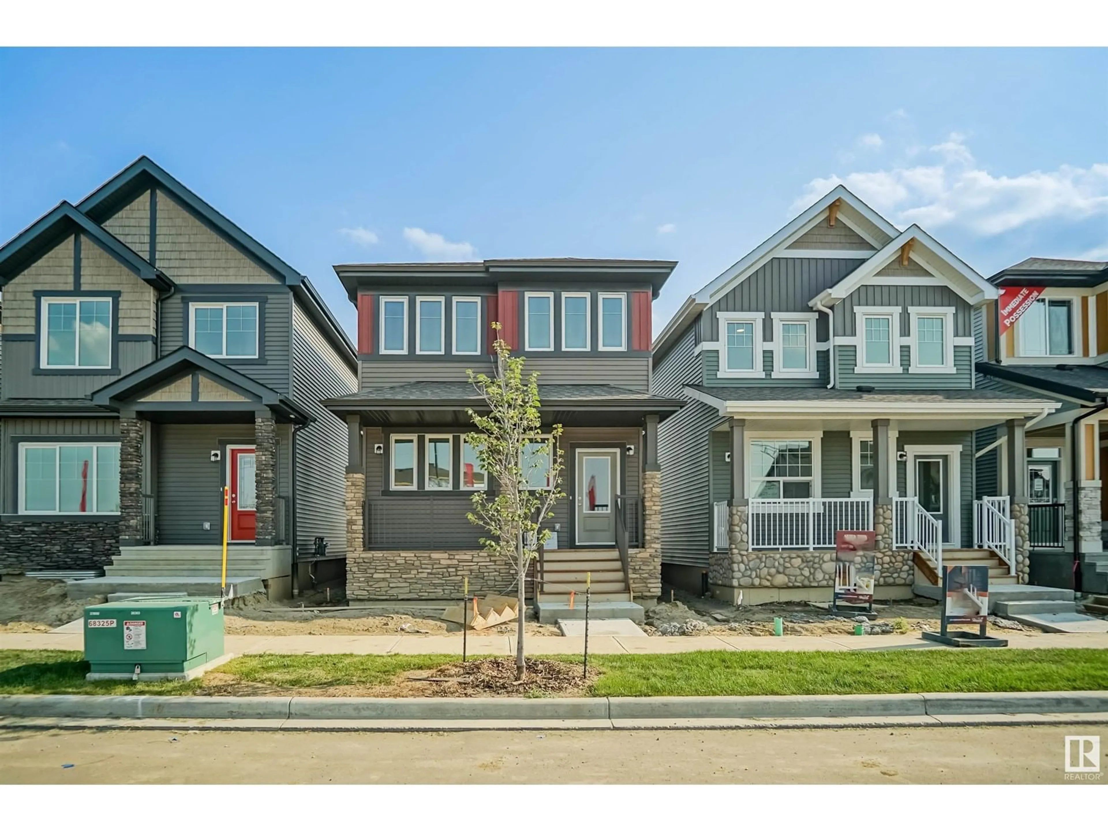 Home with brick exterior material, street for 4635 177 AV, Edmonton Alberta T5Y4B7