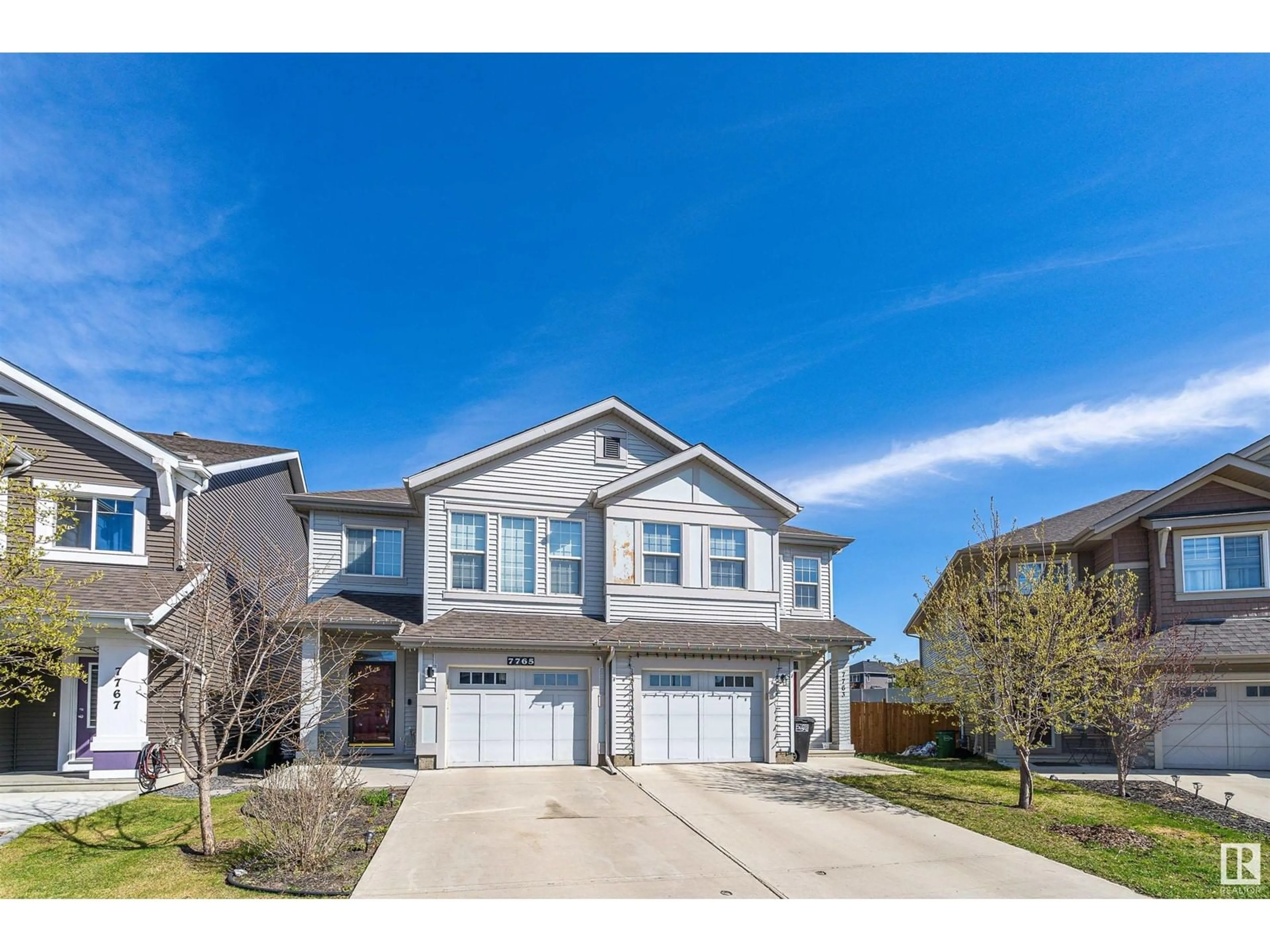 Home with vinyl exterior material, street for 7765 EIFERT CR, Edmonton Alberta T6M0W1