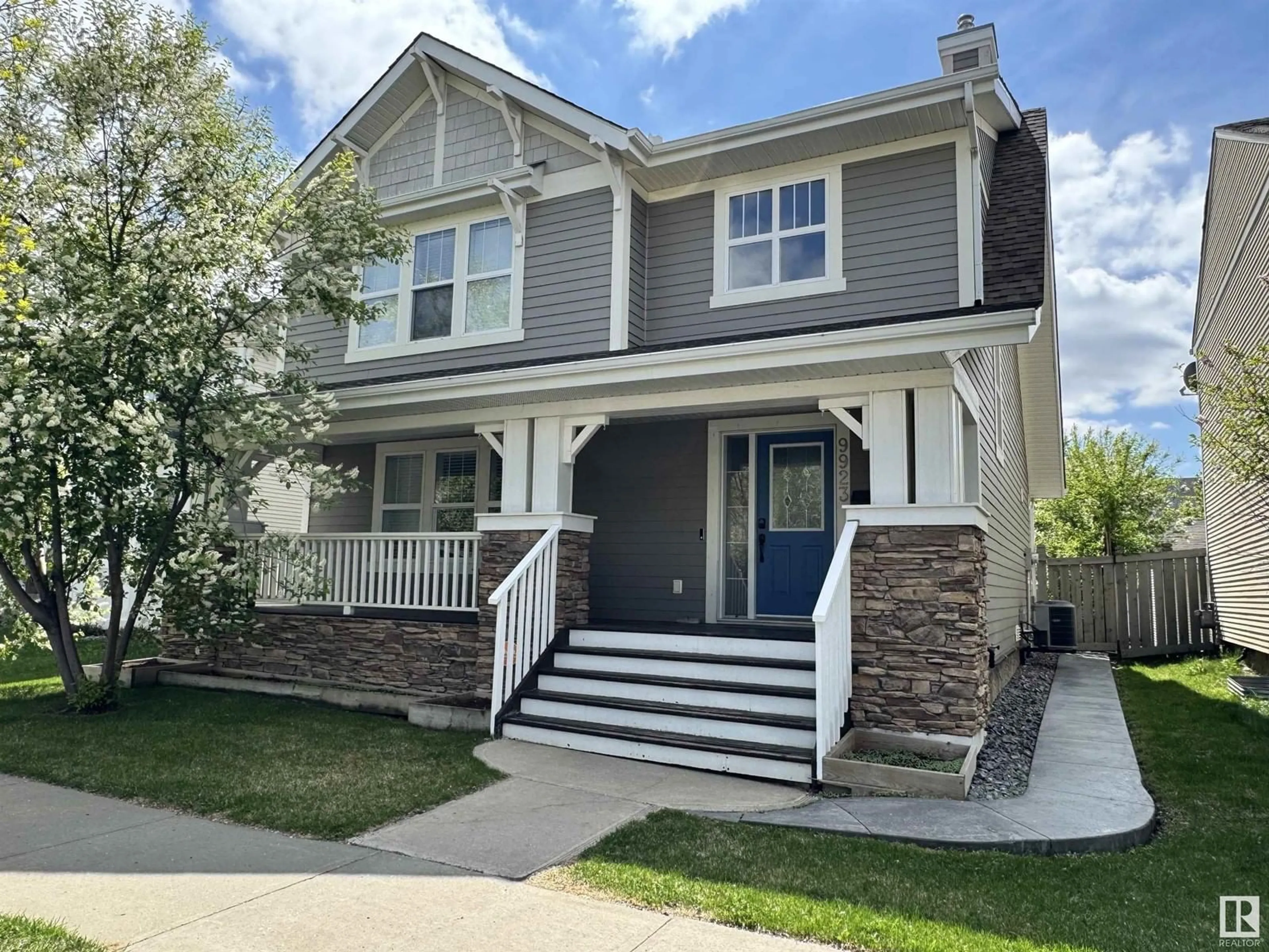 Home with vinyl exterior material, street for 9923 145 AV, Edmonton Alberta T5E6M2