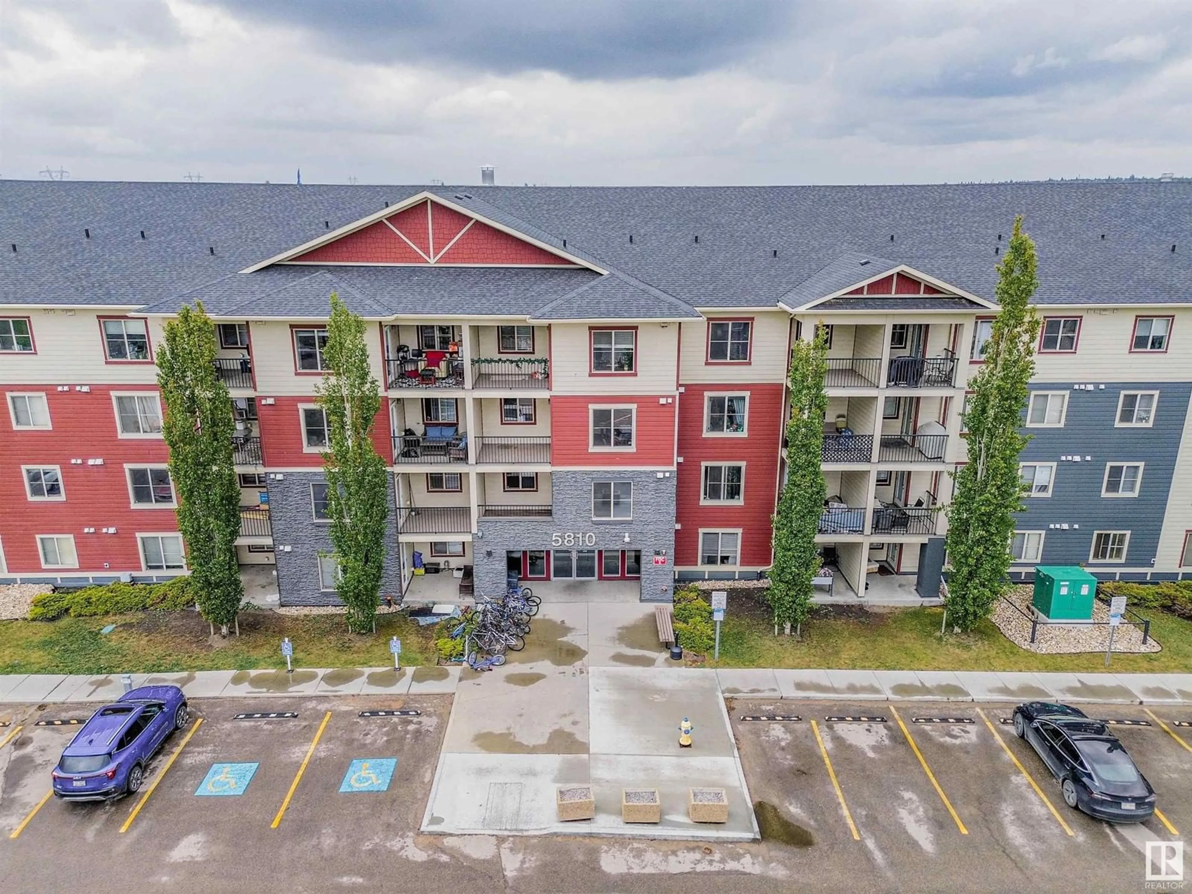 A pic from outside/outdoor area/front of a property/back of a property/a pic from drone, building for #415 - 5810 MULLEN PL, Edmonton Alberta T6R0W3