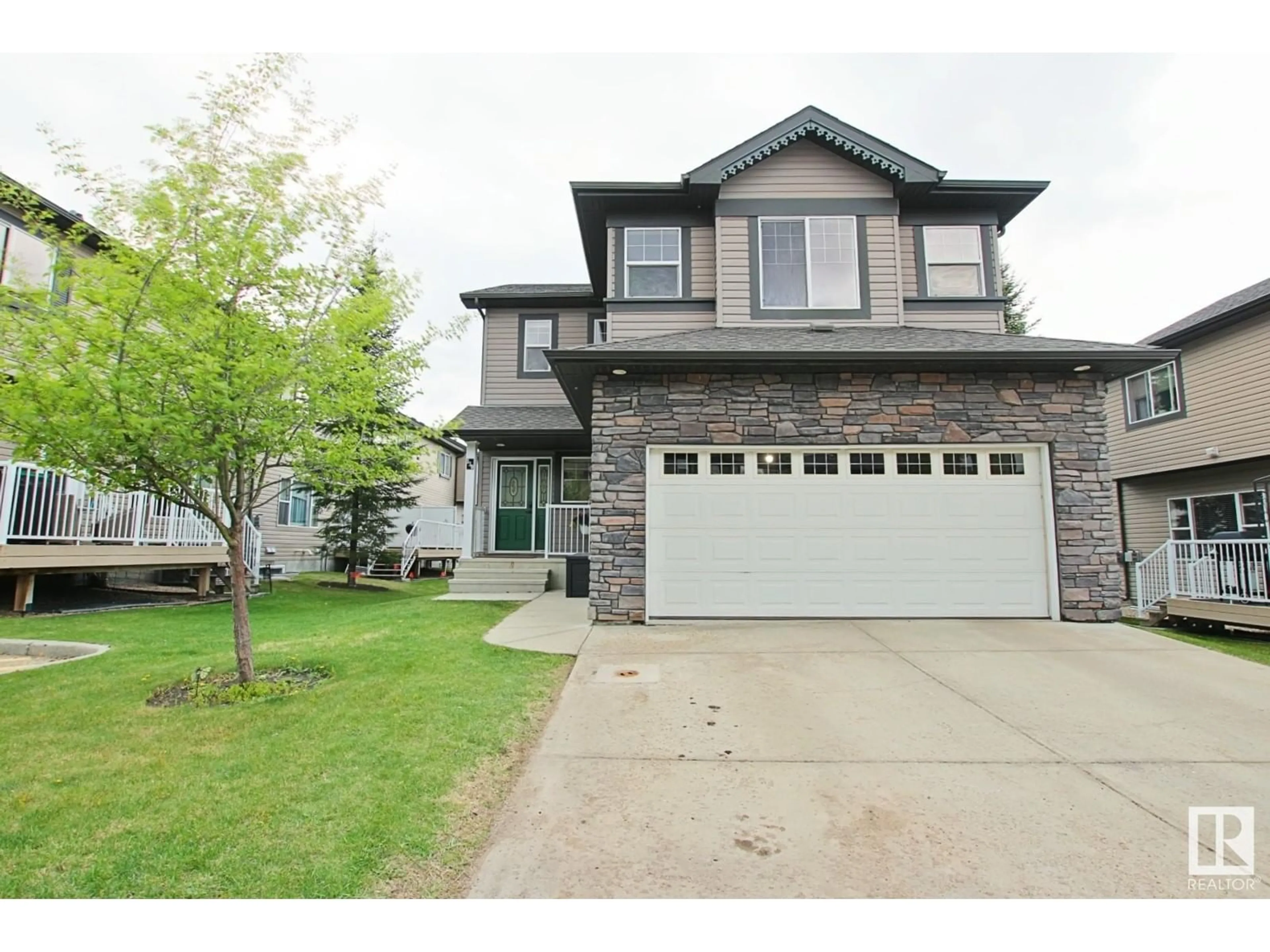Home with vinyl exterior material, street for 130 89 RUE MONETTE, Beaumont Alberta T4X1T7