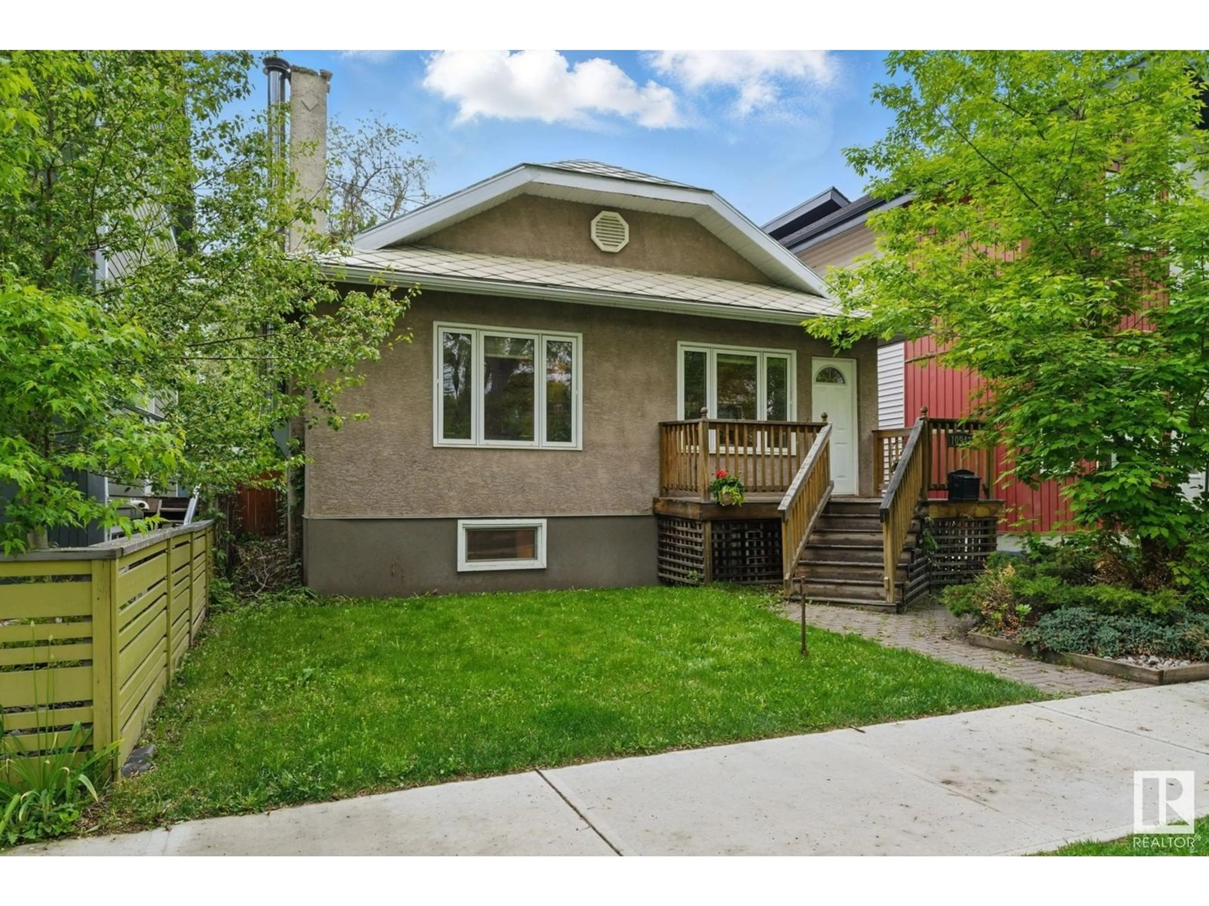 Home with brick exterior material, street for 10942 80 AV, Edmonton Alberta T6G0R1