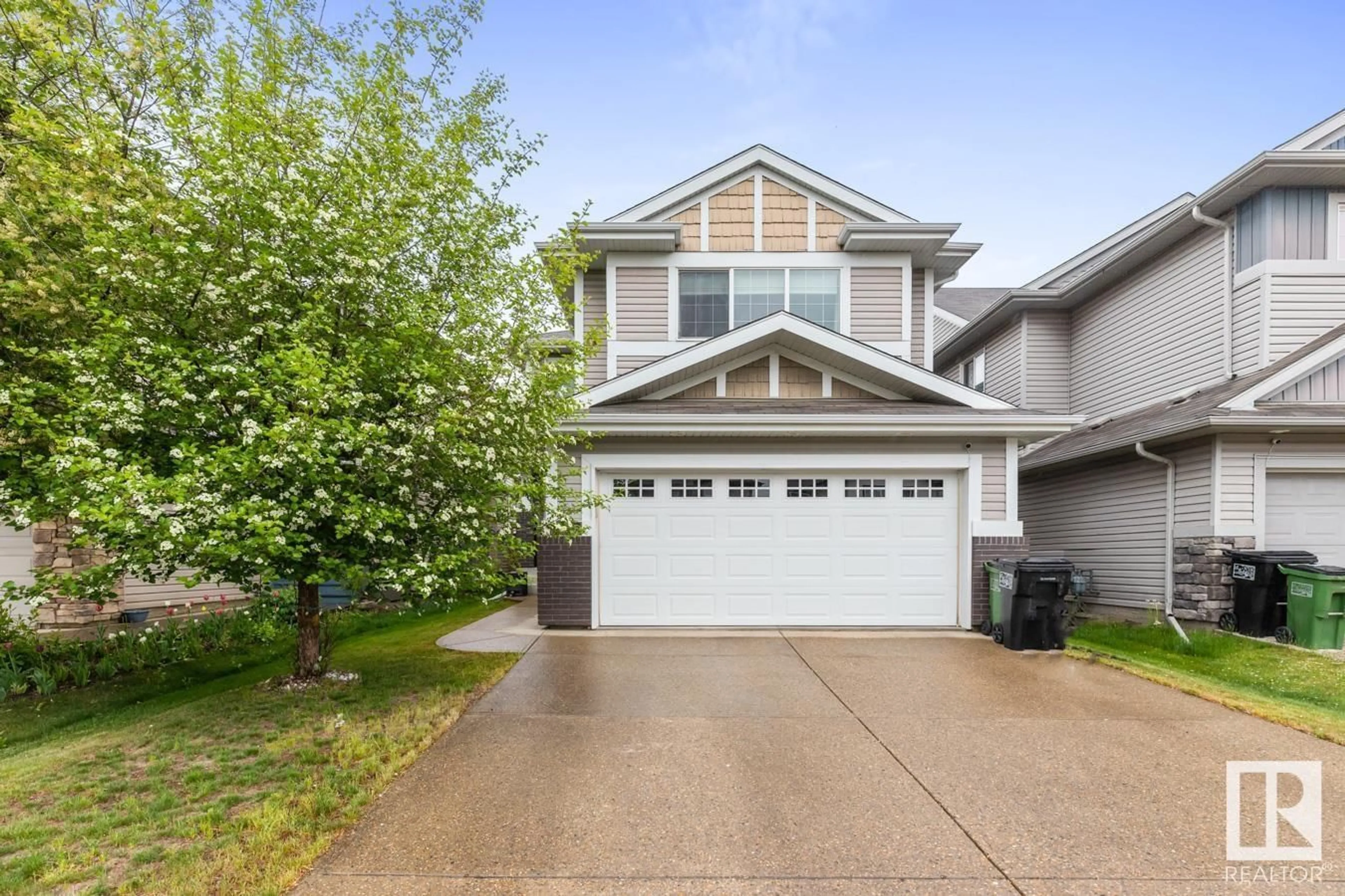 Home with vinyl exterior material, street for NW - 12416 171 AV, Edmonton Alberta T5X0E4