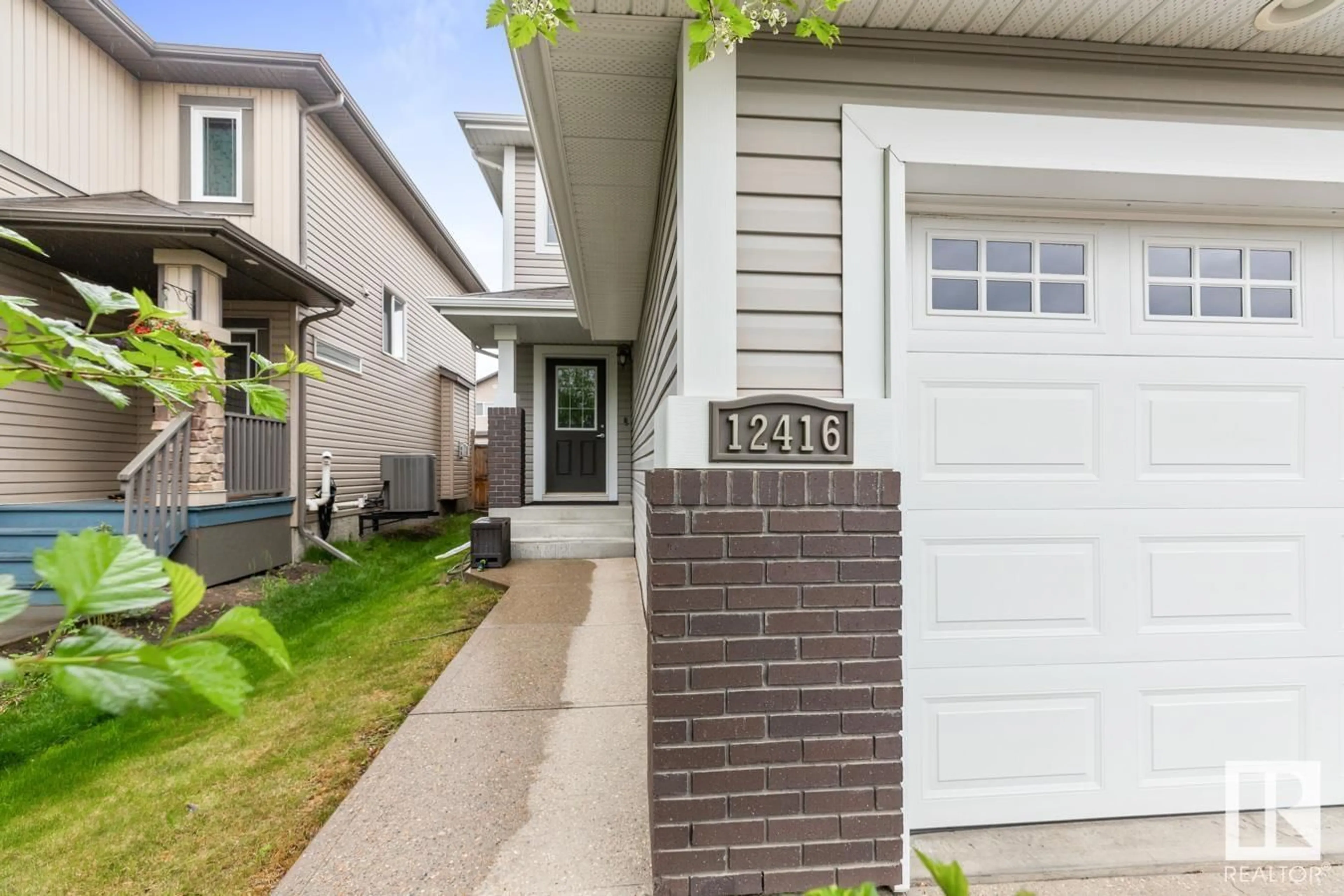 Home with vinyl exterior material, street for NW - 12416 171 AV, Edmonton Alberta T5X0E4