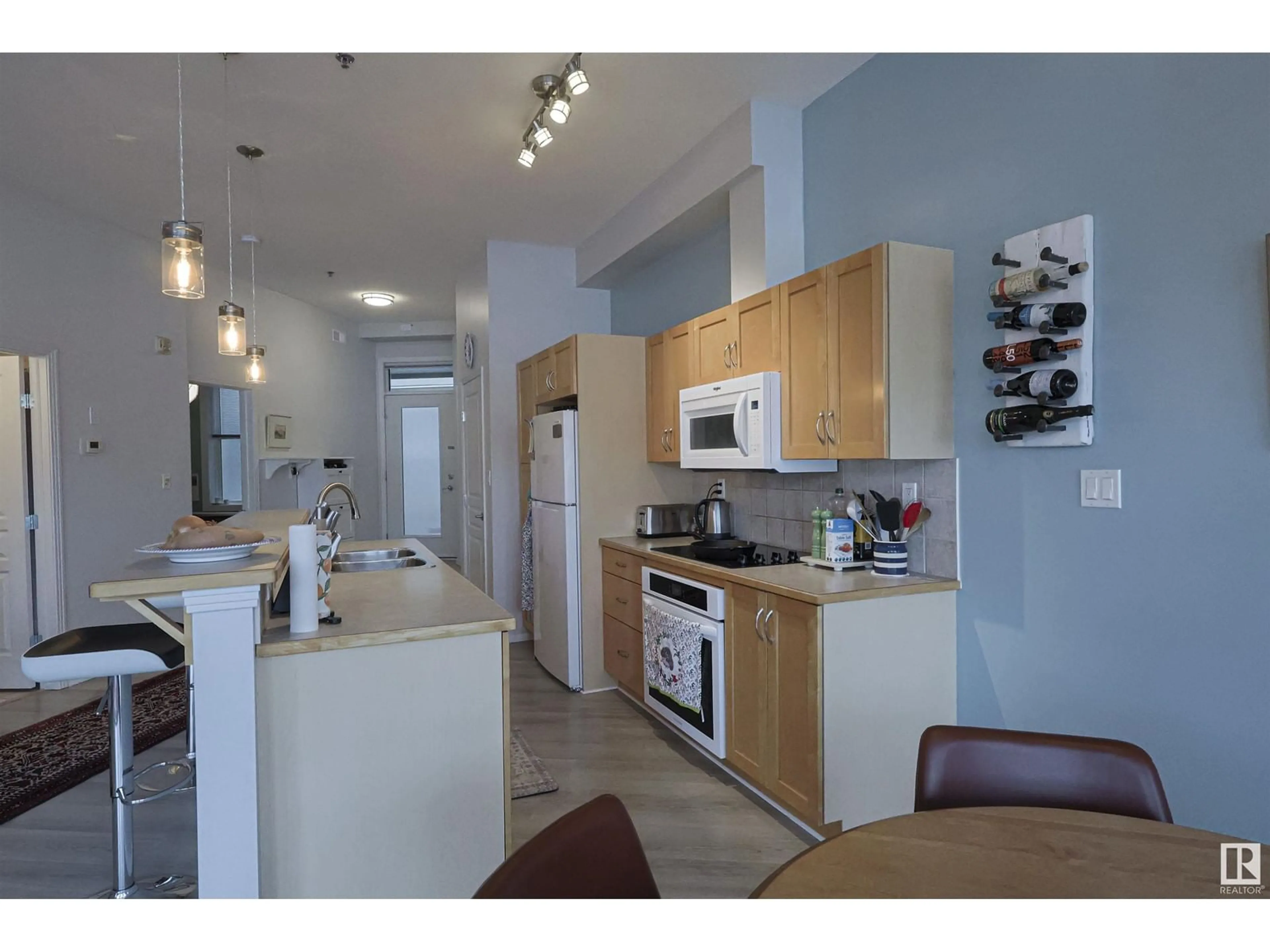 Open concept kitchen, unknown for #208 - 10147 112 ST, Edmonton Alberta T5K1M1