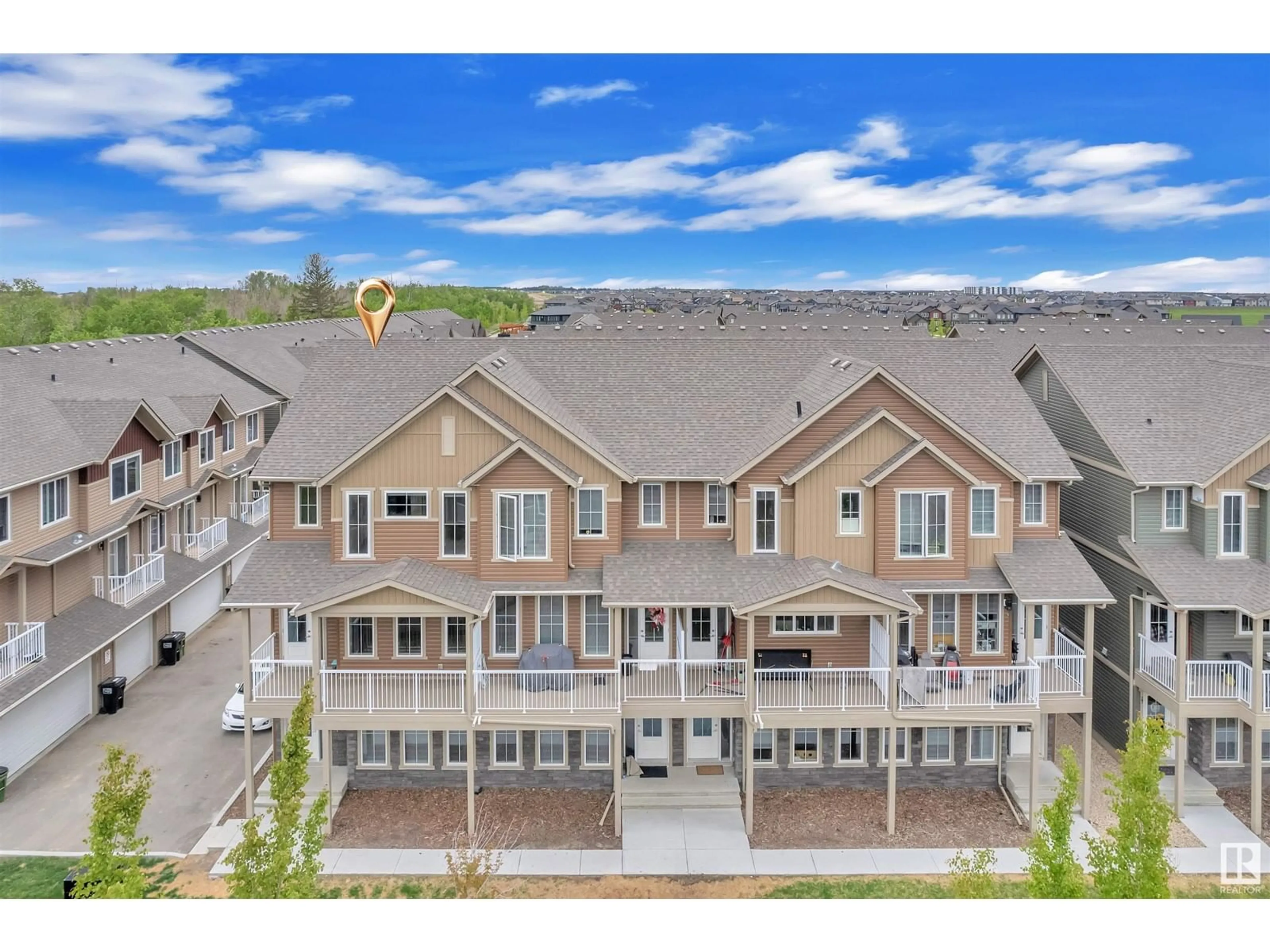 A pic from outside/outdoor area/front of a property/back of a property/a pic from drone, mountain view for #23 - 1051 GRAYDON HILL BV, Edmonton Alberta T6W3C8