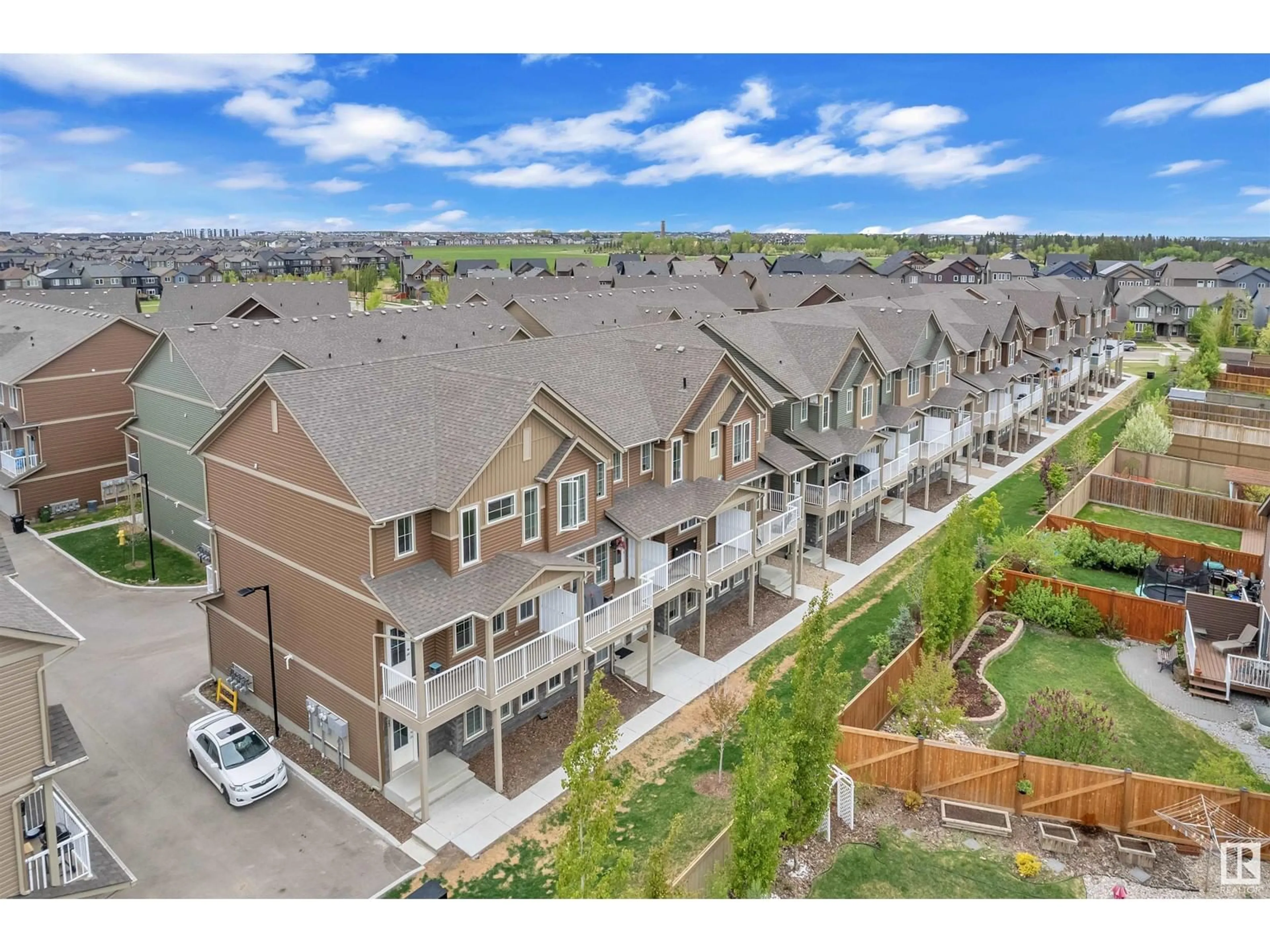 A pic from outside/outdoor area/front of a property/back of a property/a pic from drone, mountain view for #23 - 1051 GRAYDON HILL BV, Edmonton Alberta T6W3C8