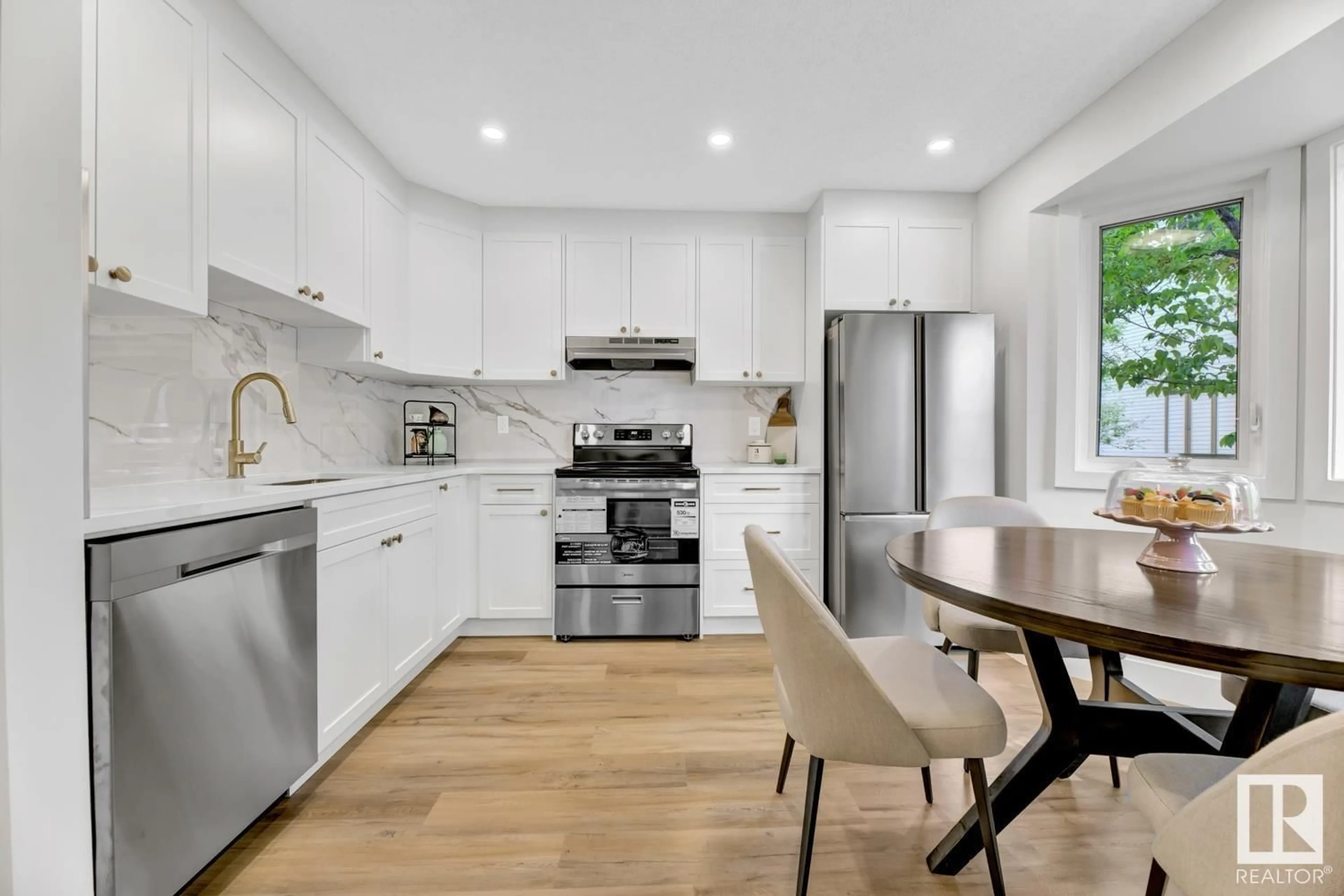 Open concept kitchen, unknown for 6109 38 AV, Edmonton Alberta T6L3Z5