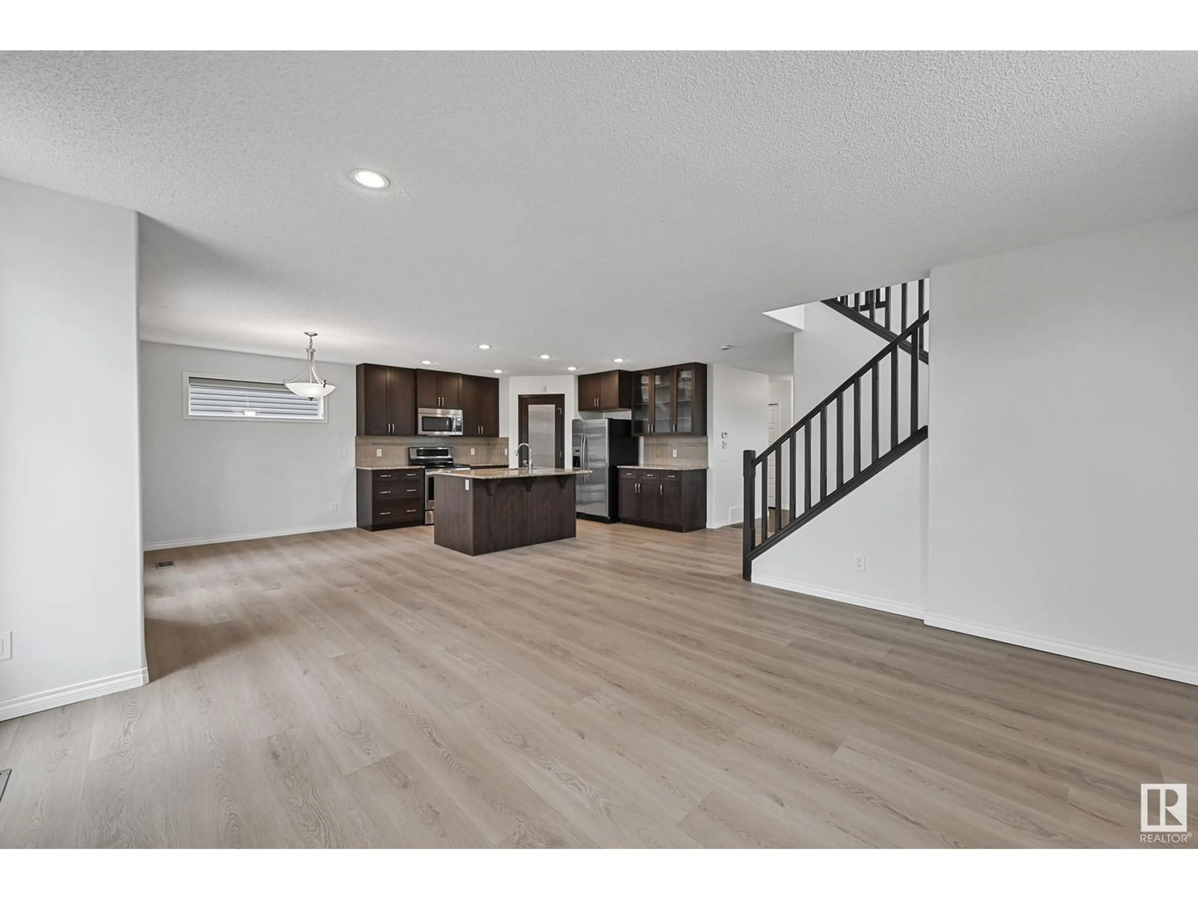 Open concept kitchen, wood/laminate floor for 25 NORTON AV, St. Albert Alberta T8N4C4