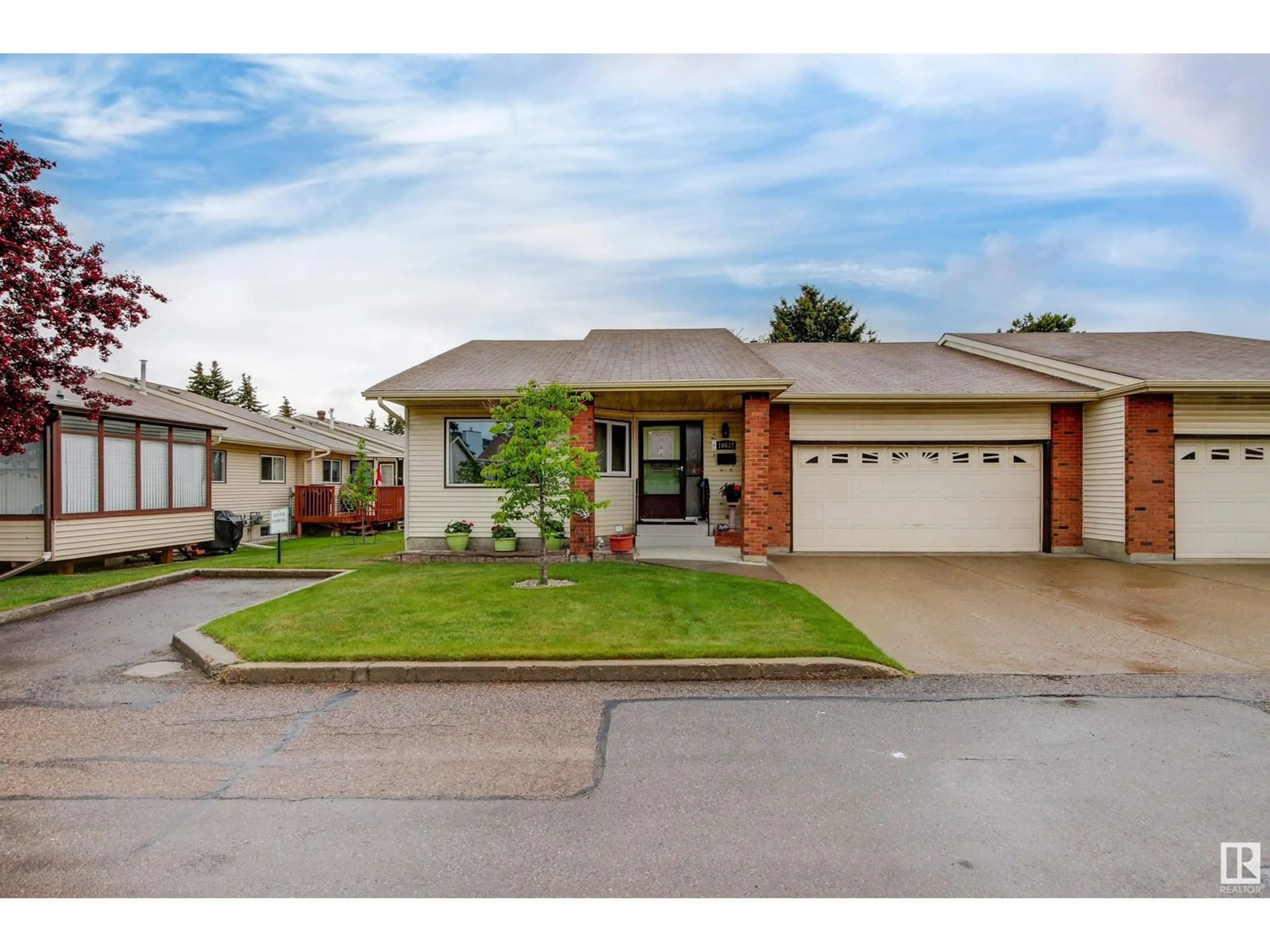 Home with brick exterior material, street for NW - 10632 153 AV, Edmonton Alberta T5X5R5