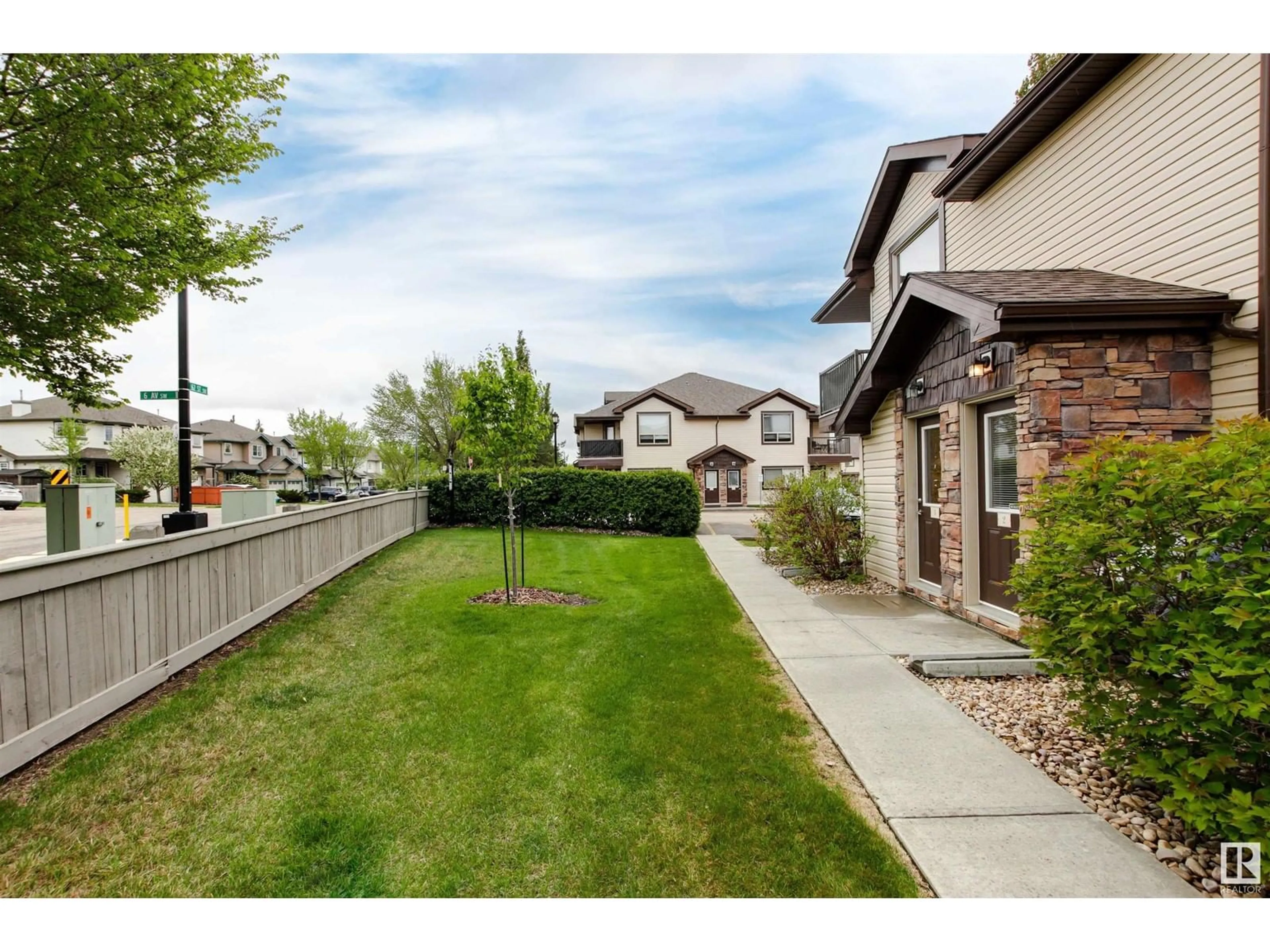 A pic from outside/outdoor area/front of a property/back of a property/a pic from drone, street for #2 - 604 62 ST, Edmonton Alberta T6X0K4