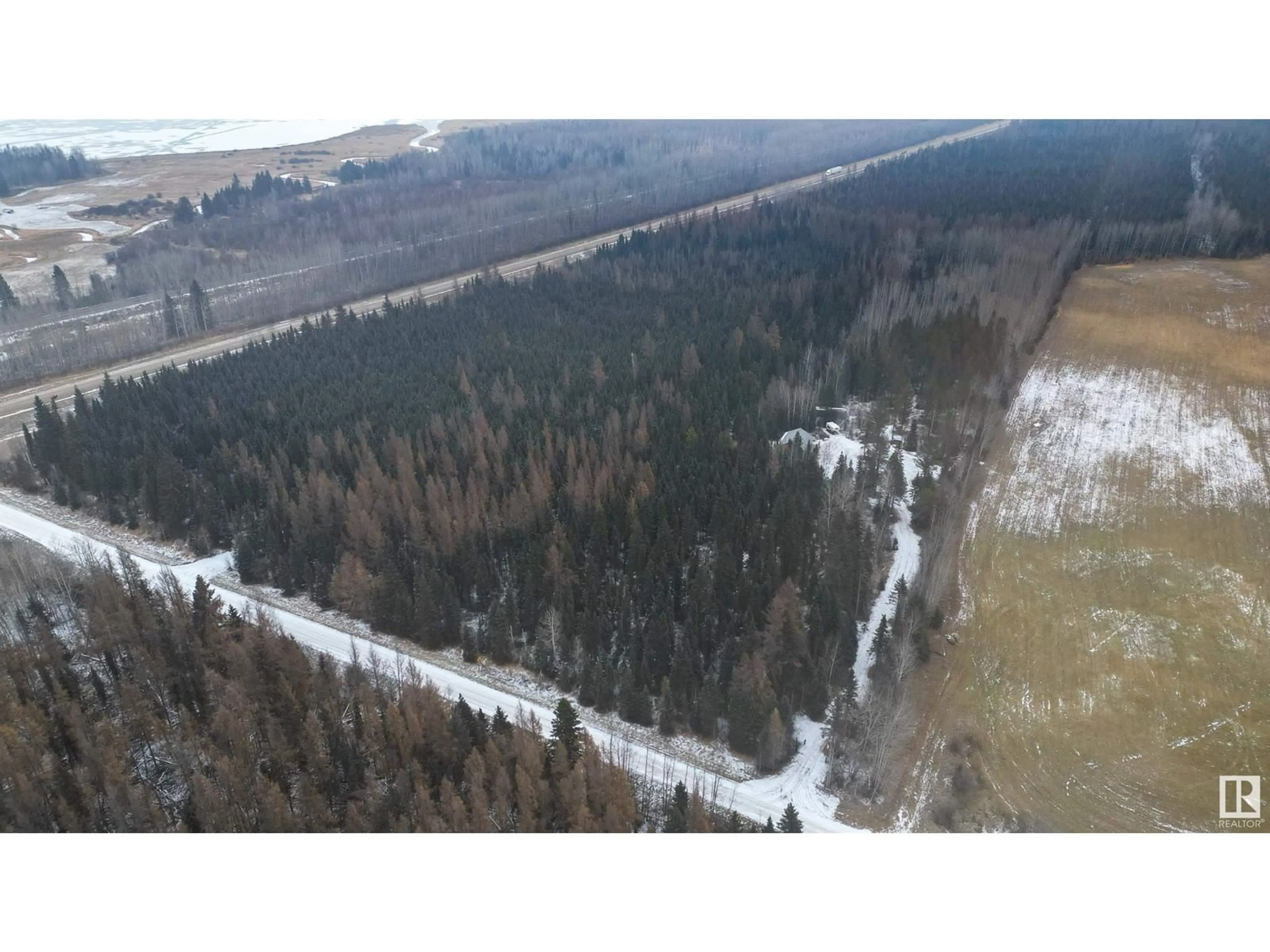 A pic from outside/outdoor area/front of a property/back of a property/a pic from drone, forest/trees view for 53417 RANGE RD 100, Rural Yellowhead Alberta T0E2M0