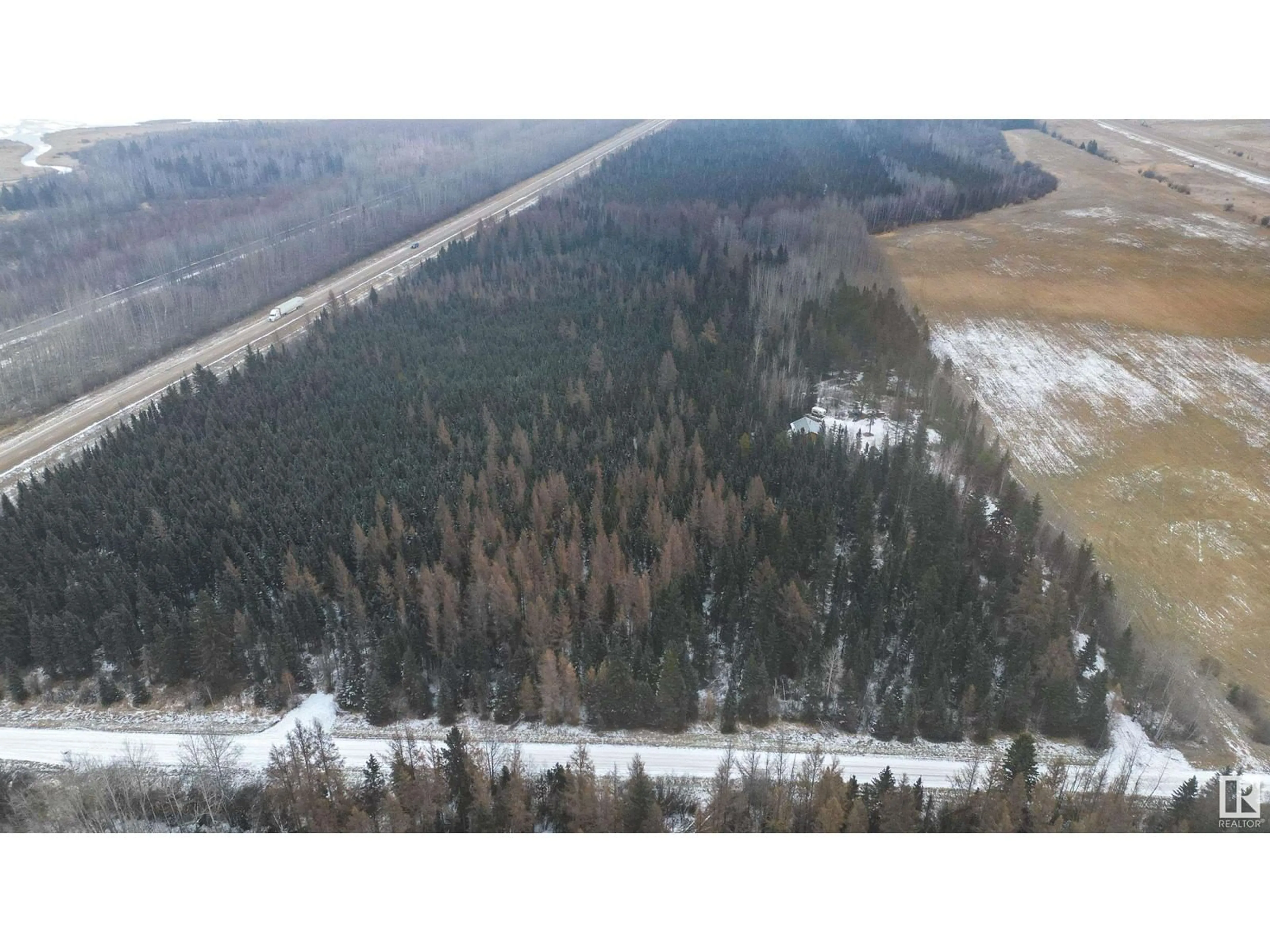 A pic from outside/outdoor area/front of a property/back of a property/a pic from drone, forest/trees view for 53417 RANGE RD 100, Rural Yellowhead Alberta T0E2M0