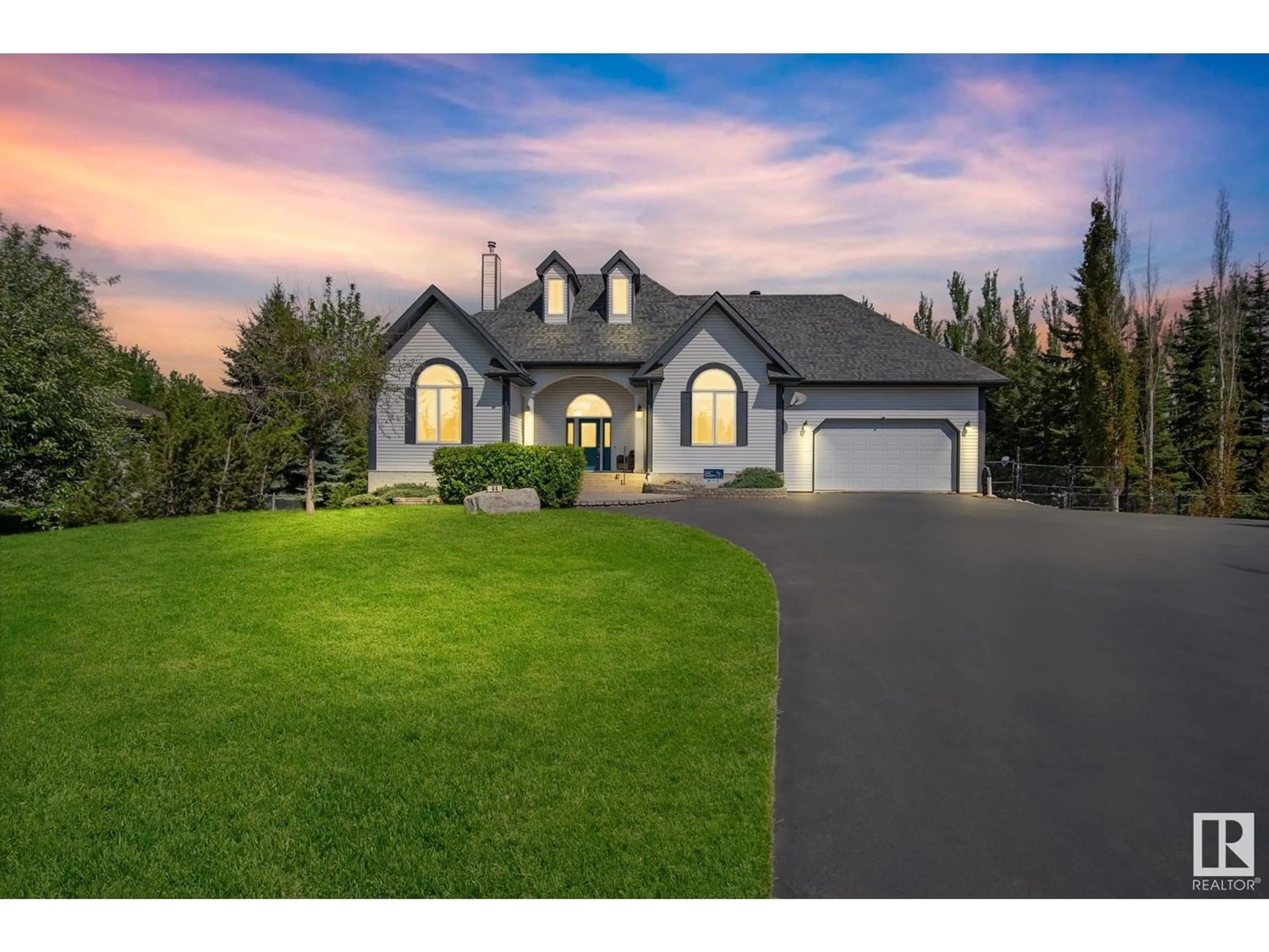 A pic from outside/outdoor area/front of a property/back of a property/a pic from drone, street for 26106 TWP ROAD 532 A, Rural Parkland County Alberta T7Y1A3