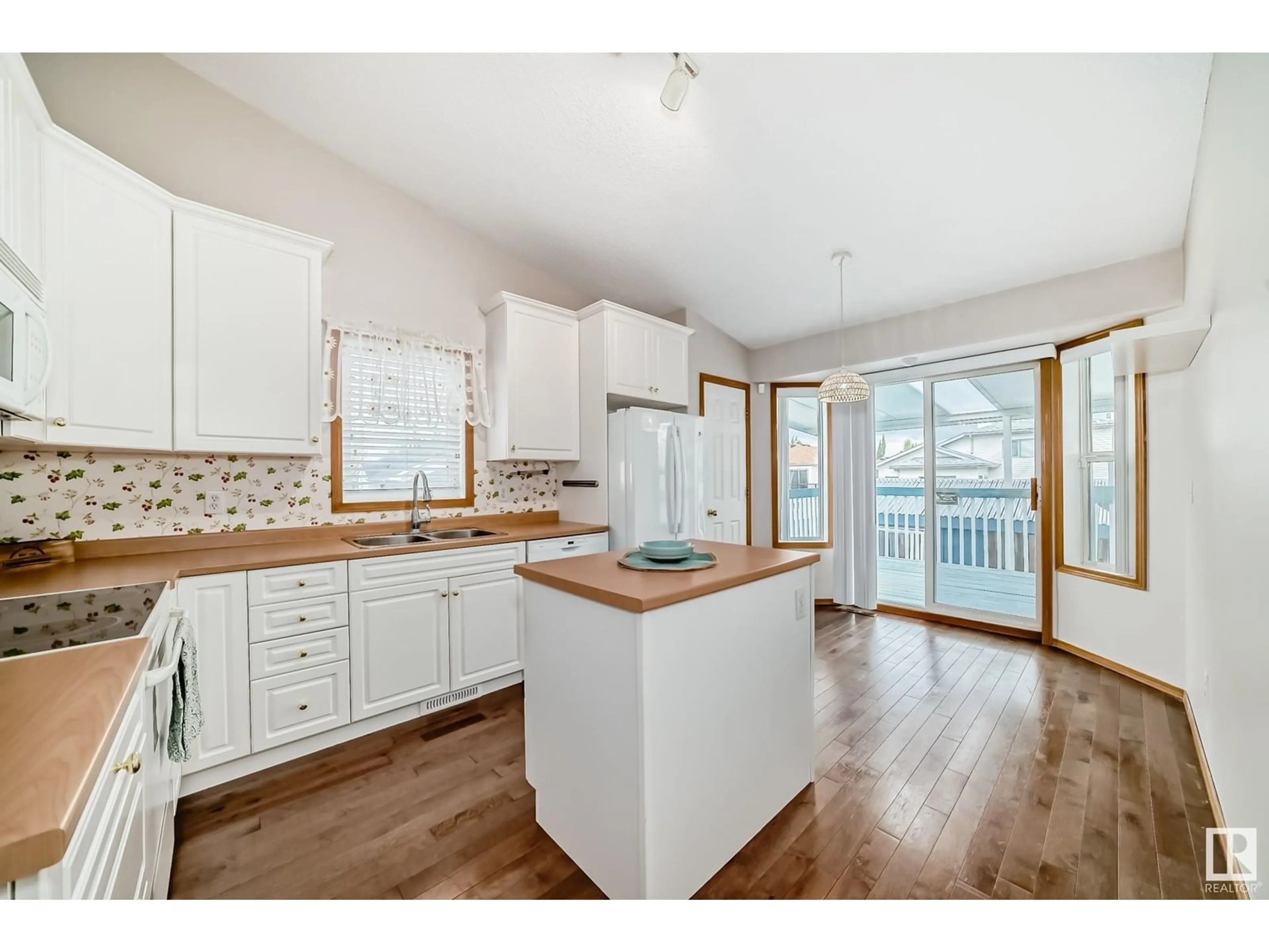 Open concept kitchen, wood/laminate floor for 80 CACTUS WY, Sherwood Park Alberta T8H1T2
