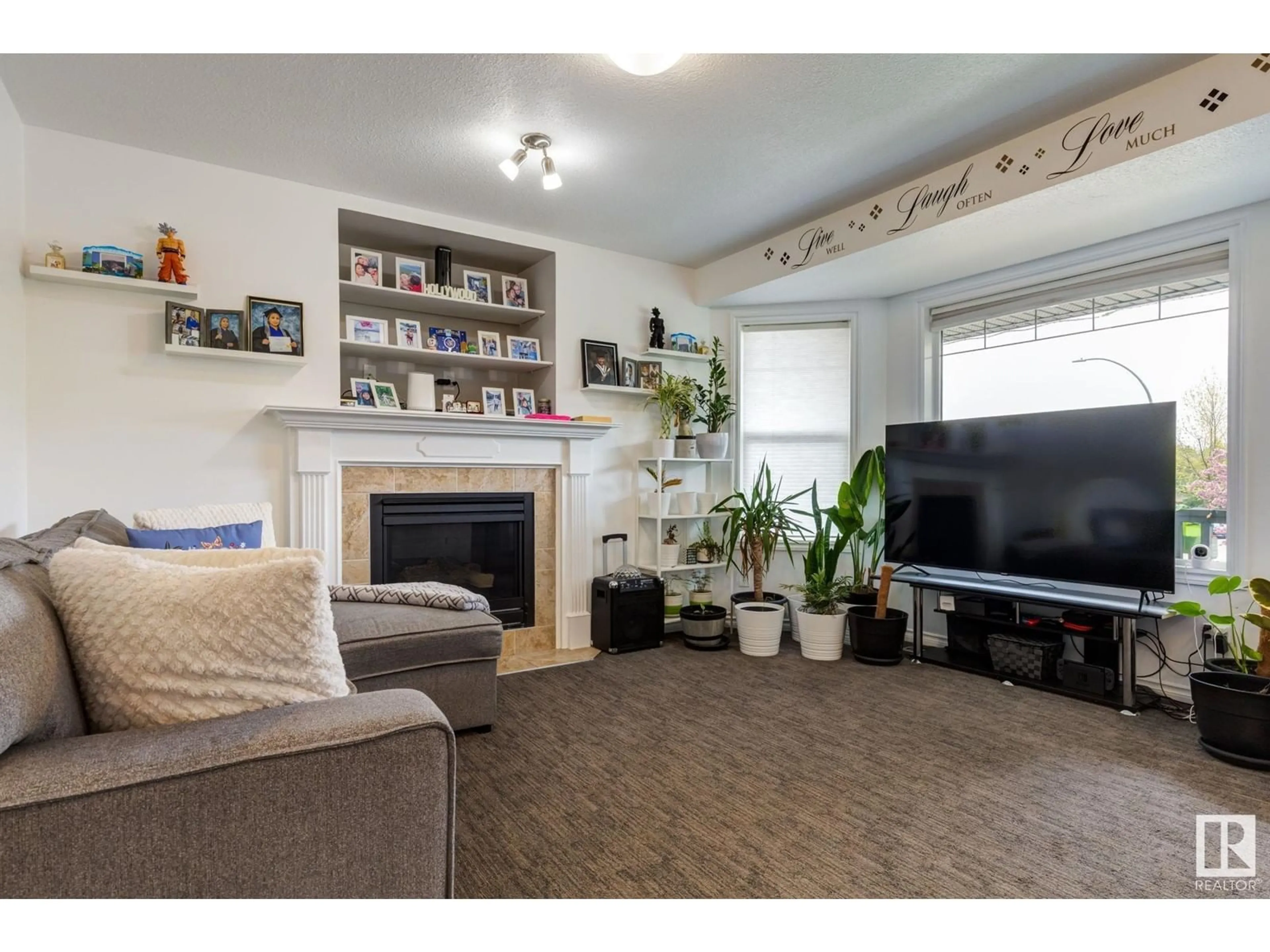 Living room with furniture, wood/laminate floor for 43 VERONICA HL, Spruce Grove Alberta T7X0G9