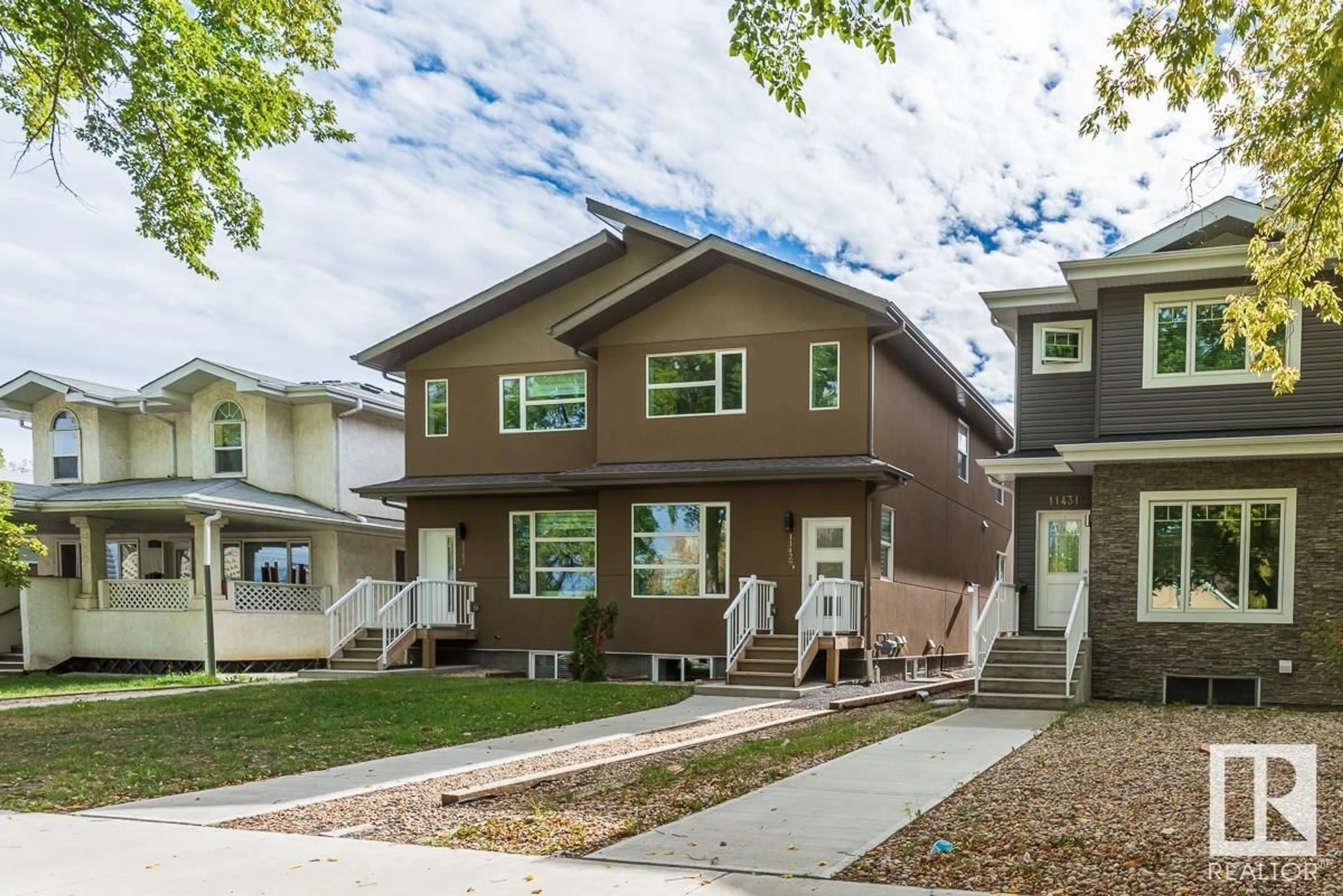 Home with vinyl exterior material, street for 11429 80 AV, Edmonton Alberta T6G0R6