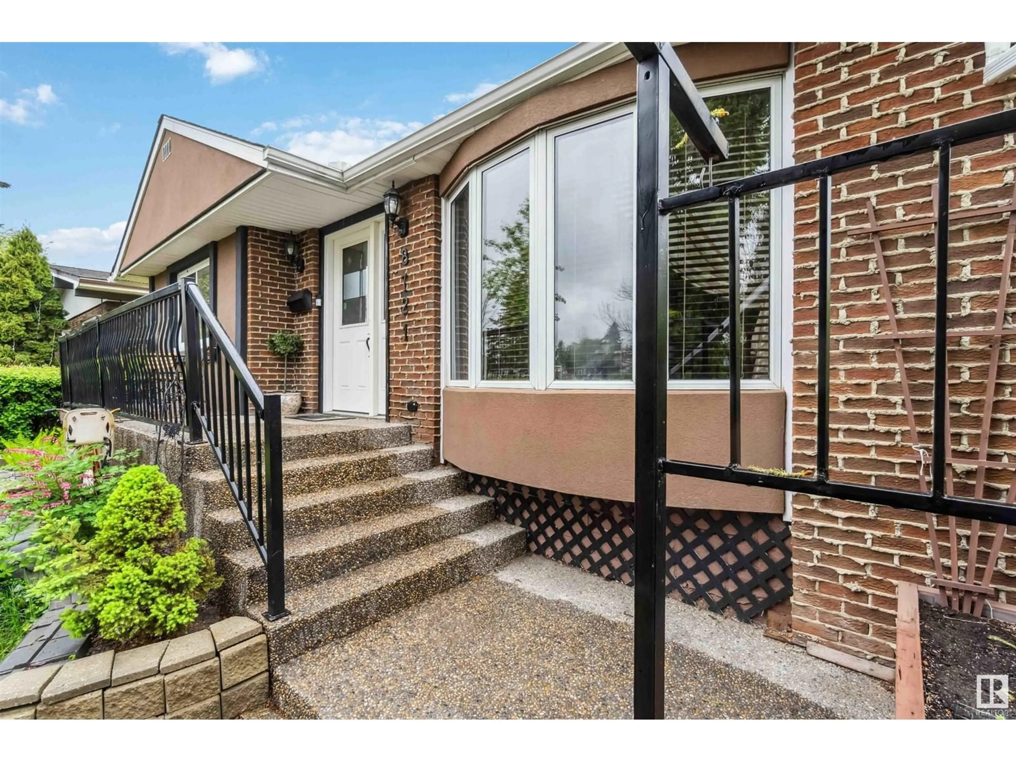 Home with brick exterior material, street for 8721 152 ST, Edmonton Alberta T5R1L9