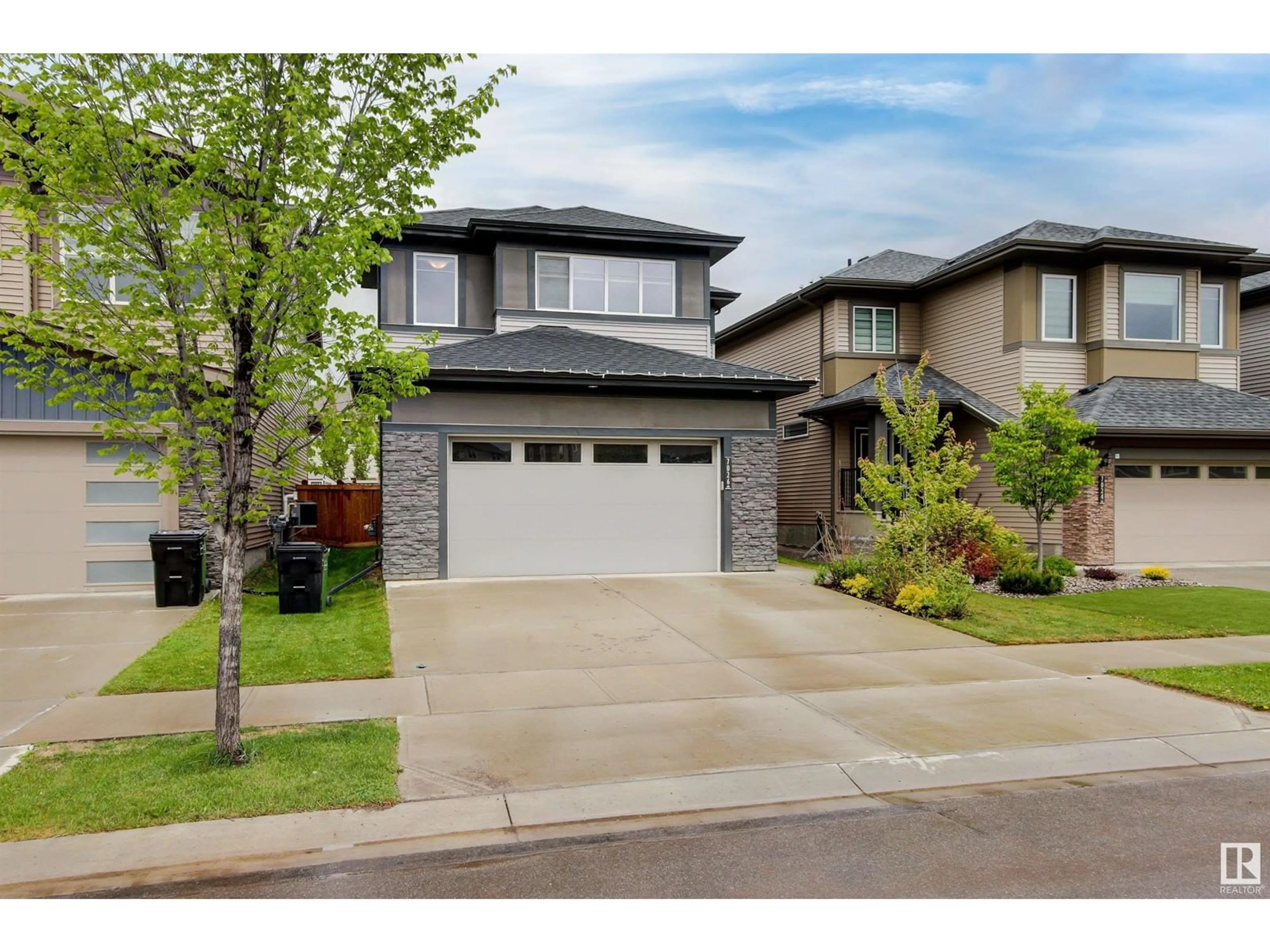 Home with vinyl exterior material, street for 7026 CHIVERS LO, Edmonton Alberta T6W3Y7