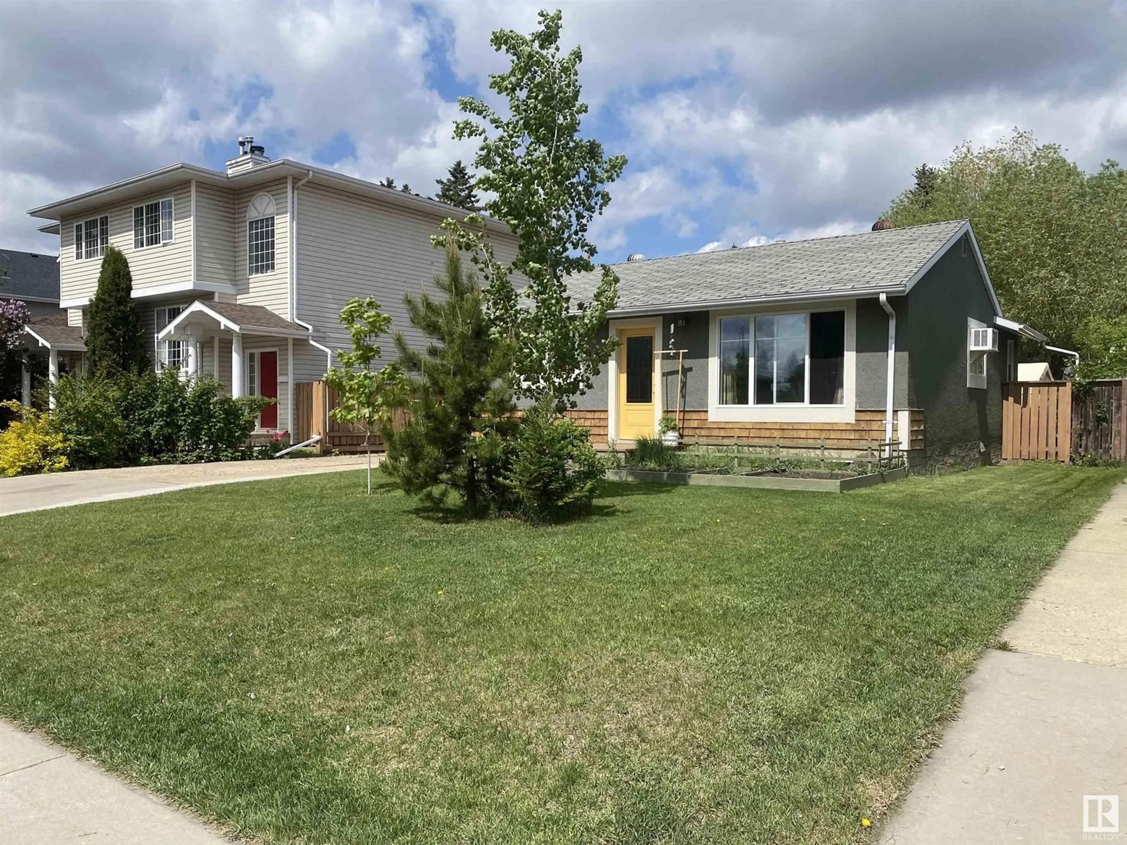 Home with vinyl exterior material, street for 7124 80 AV, Edmonton Alberta T6B0C6