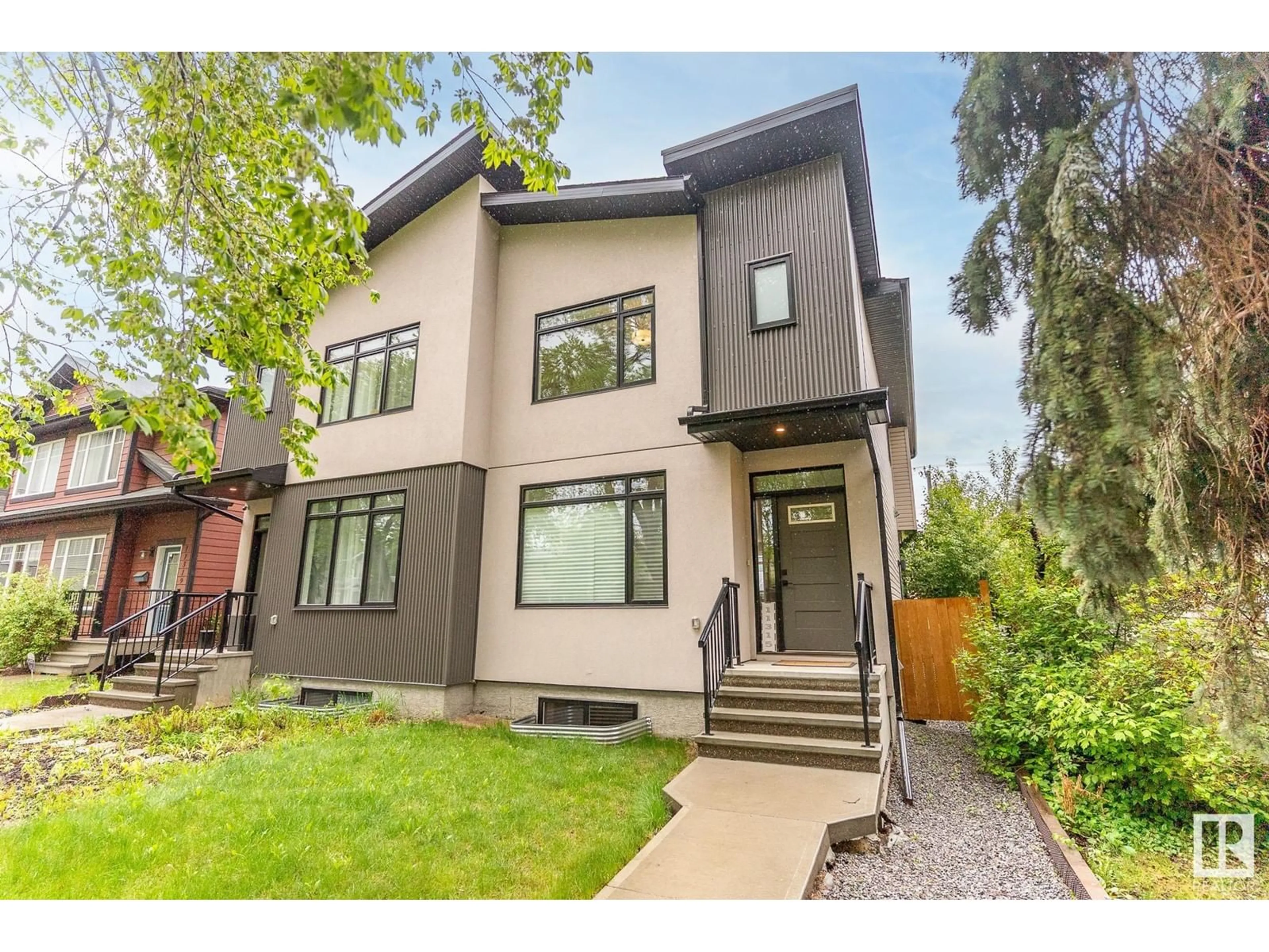 Home with brick exterior material, street for 11315 122 ST NW, Edmonton Alberta T5M0B6