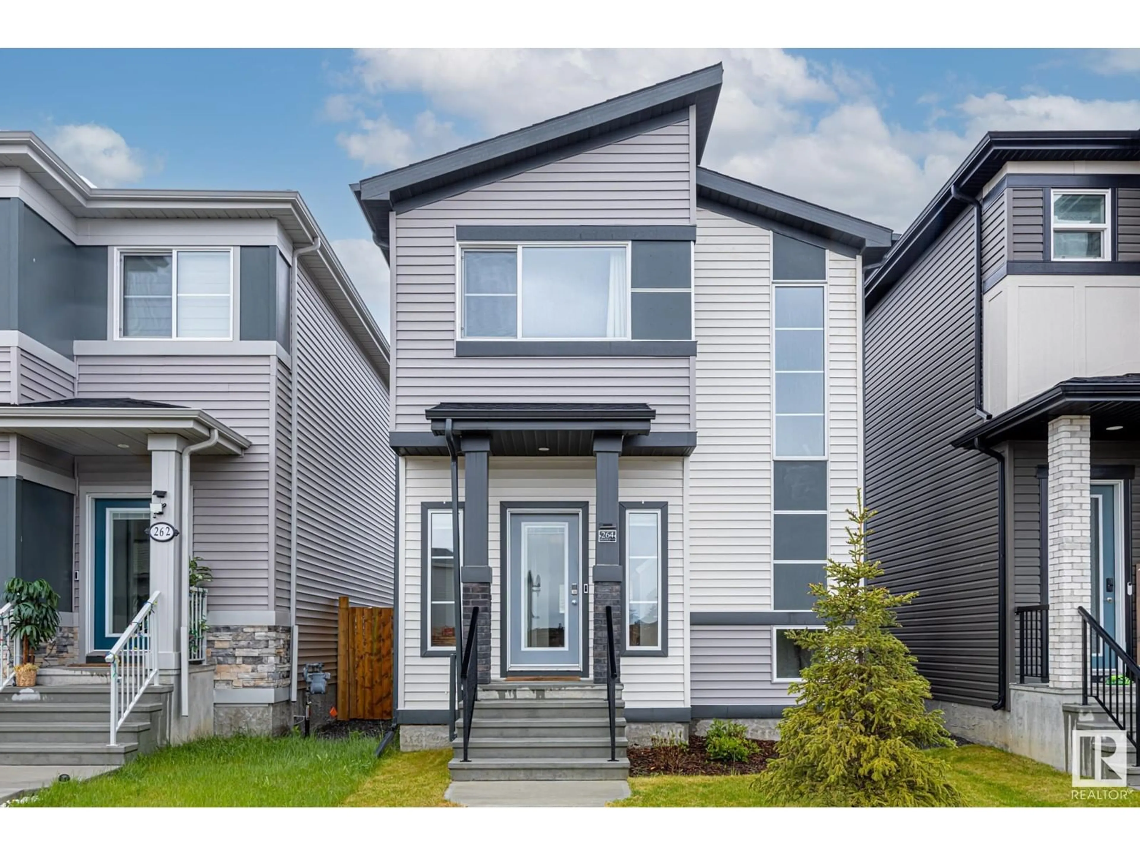 Home with vinyl exterior material, street for 264 ROLSTON WD, Leduc Alberta T9E1N1