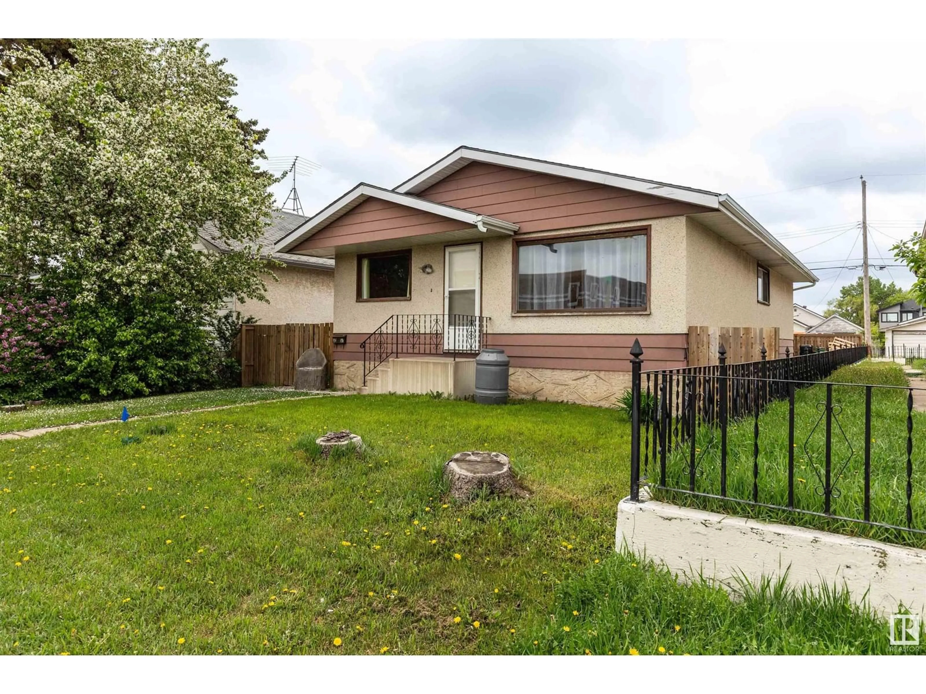 Home with vinyl exterior material, street for 16115 100A AV, Edmonton Alberta T5P0L9