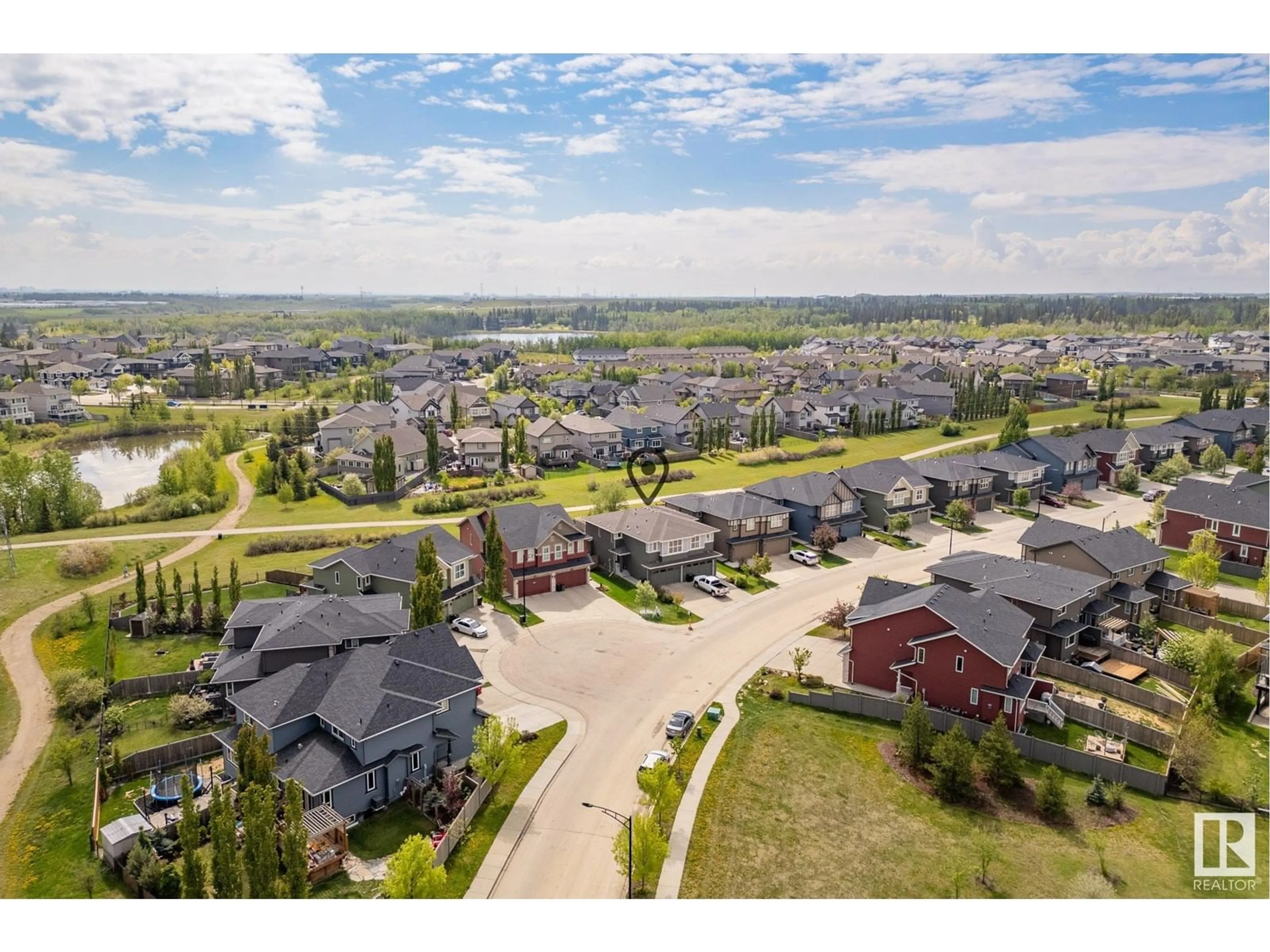 A pic from outside/outdoor area/front of a property/back of a property/a pic from drone, water/lake/river/ocean view for NW - 13117 205 ST, Edmonton Alberta T5S0J2