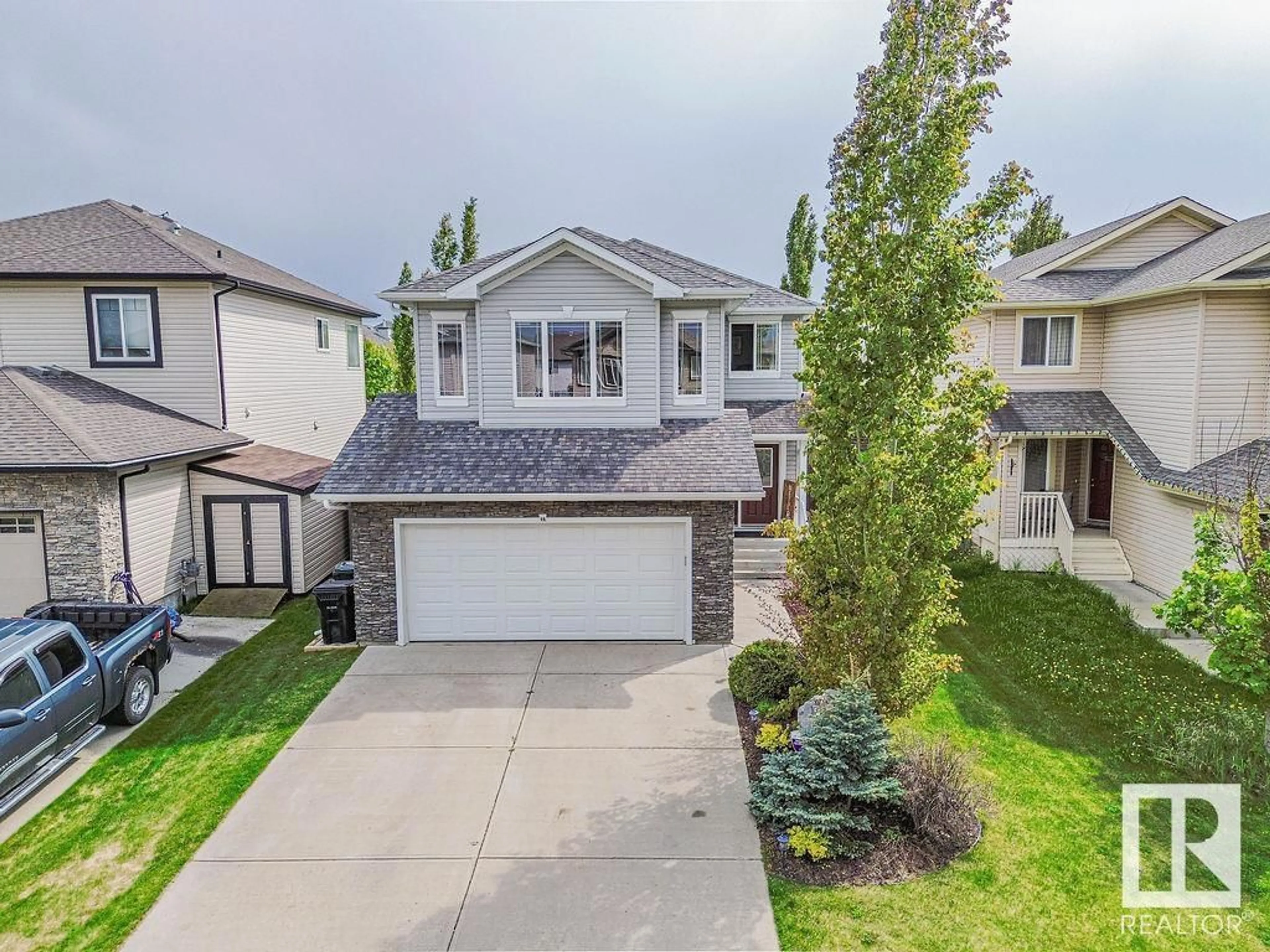A pic from outside/outdoor area/front of a property/back of a property/a pic from drone, street for 21 ASHTON GA, Spruce Grove Alberta T7X0H9