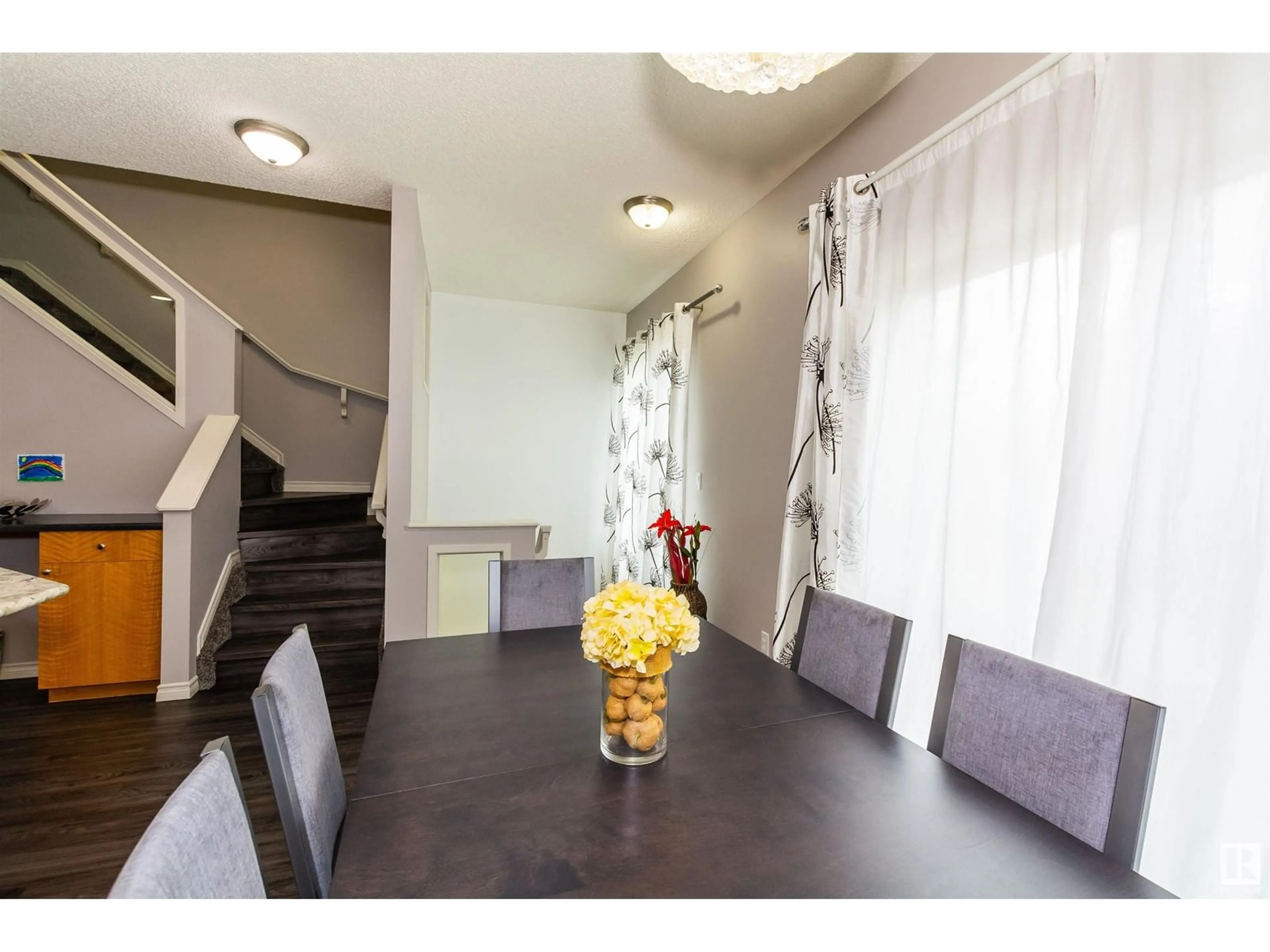 Dining room, wood/laminate floor for #97 - 13825 155 AV, Edmonton Alberta T6V0B8