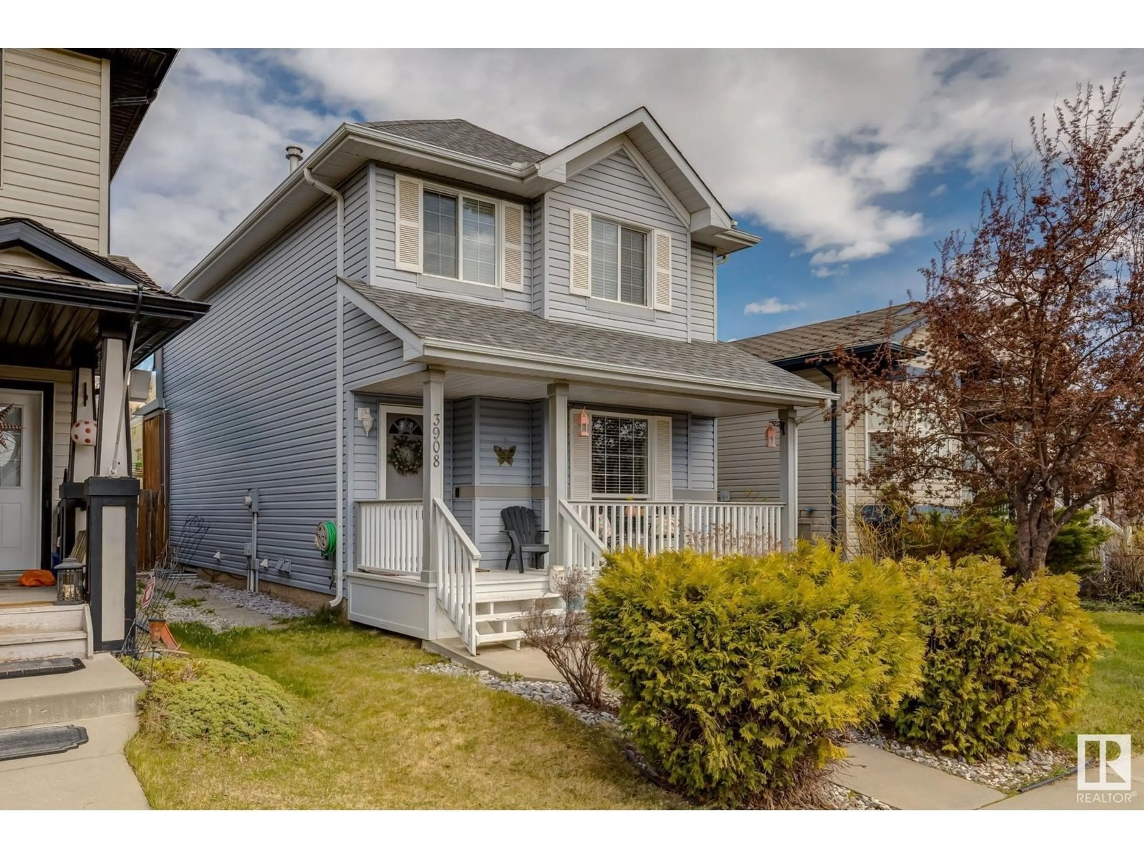 Home with vinyl exterior material, street for 3908 160 AV, Edmonton Alberta T5Y3J7